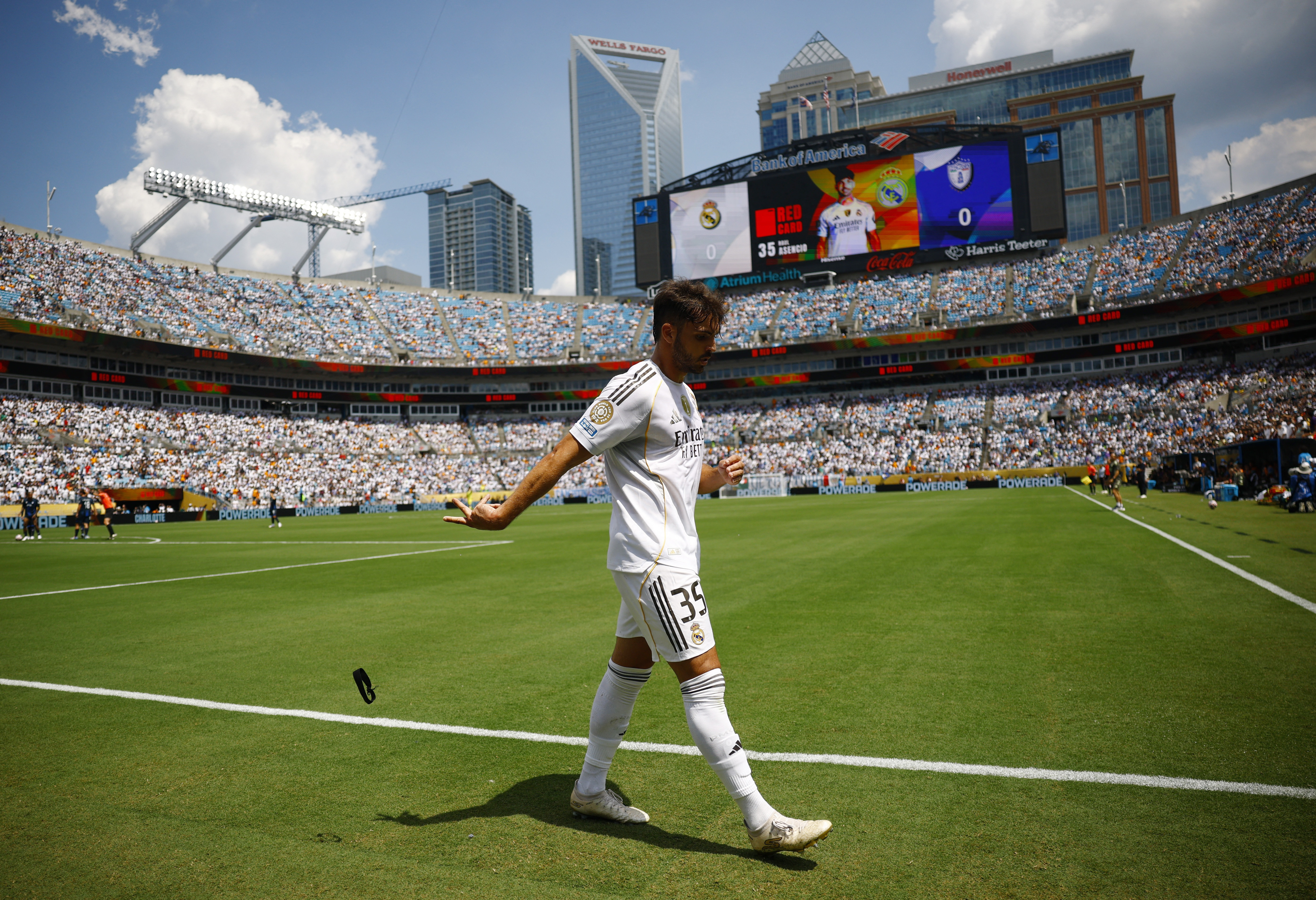 Asencio walks off the pitch after being given a red card