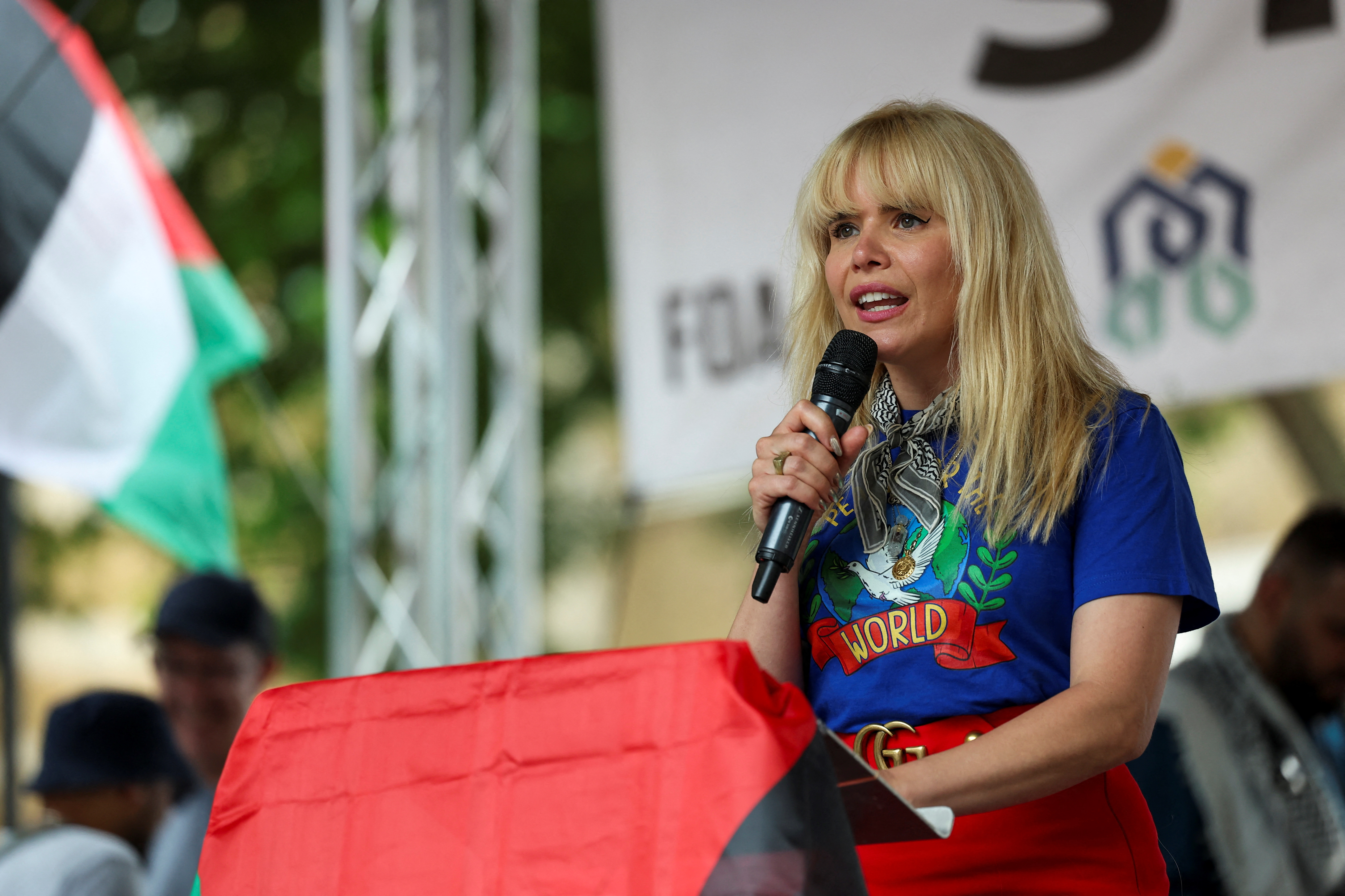 Paloma Faith speaks as pro-Palestinian demonstrators protest through central London, calling for the UK government to stop allowing arms exports and military co-operation with Israel, in London, Britain, June 21, 2025. REUTERS/Isabel Infantes