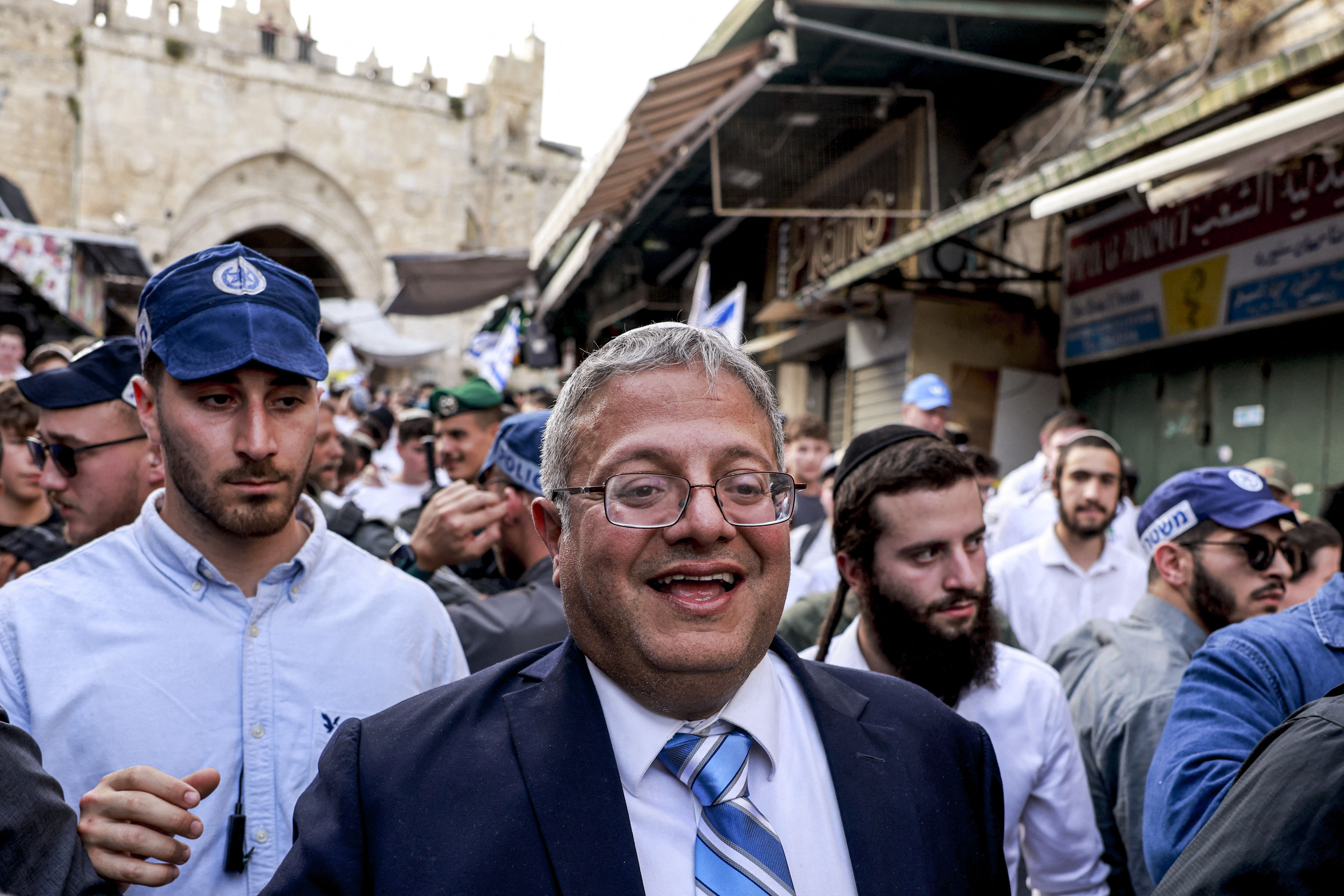 Israeli policemen escort Israeli Minister of National Security and far-right politician Itamar Ben-Gvir