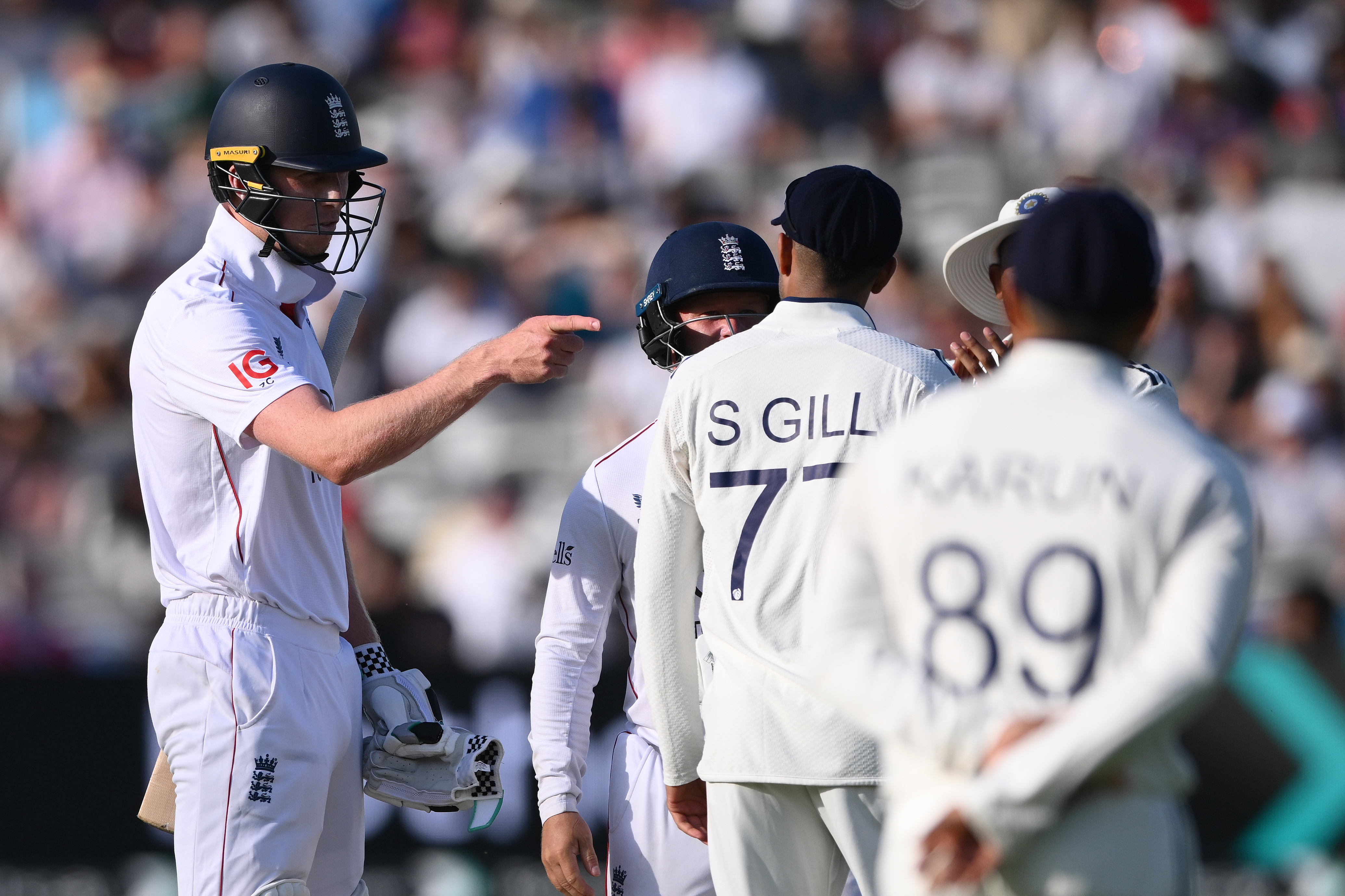 England opener Zak Crawley makes his own point back to India captain Shubman Gill after the hosts’ batter called for the doctor after being hit on the finger during day three