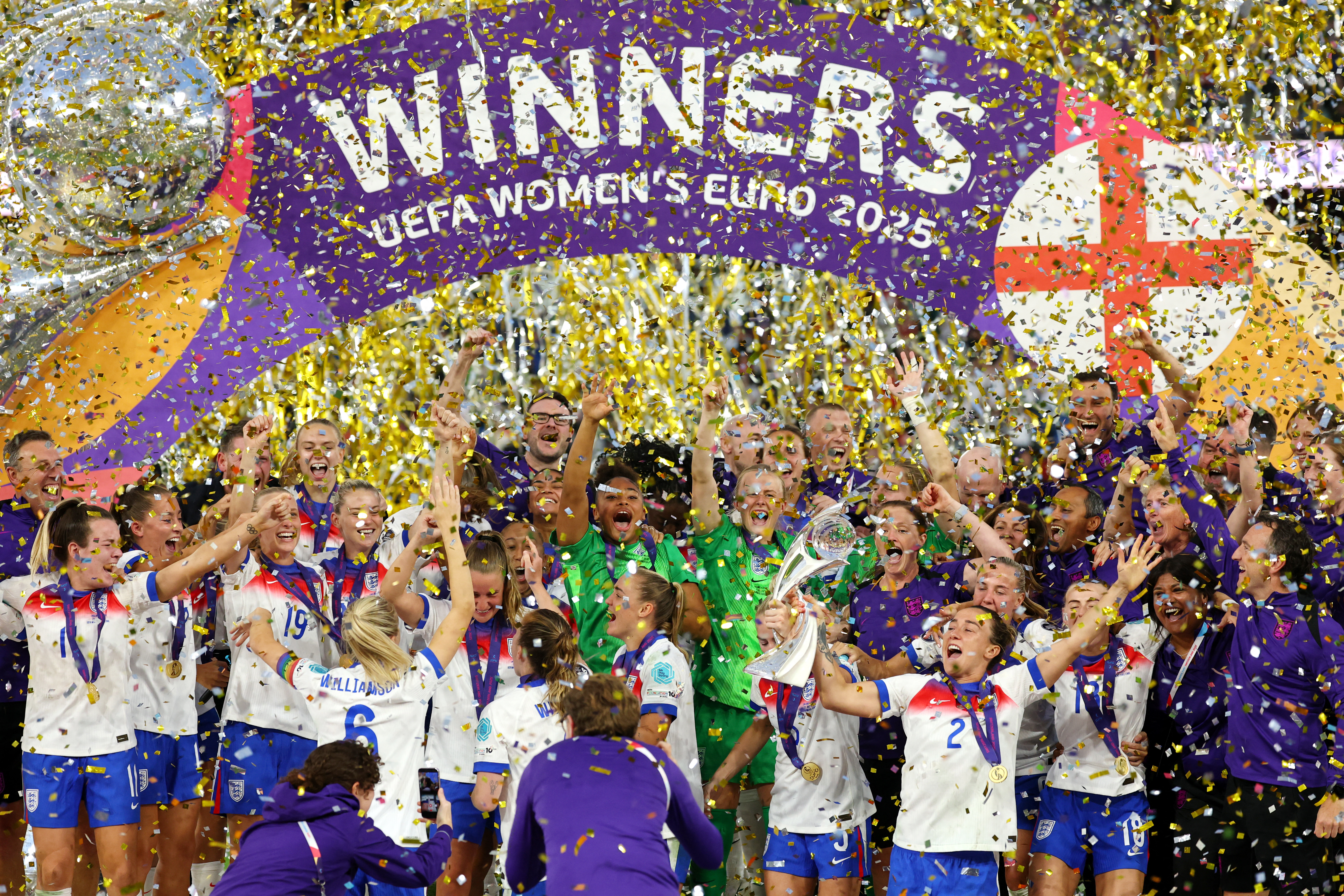 England players celebrate with the trophy after winning the UEFA Women's Euro 2025