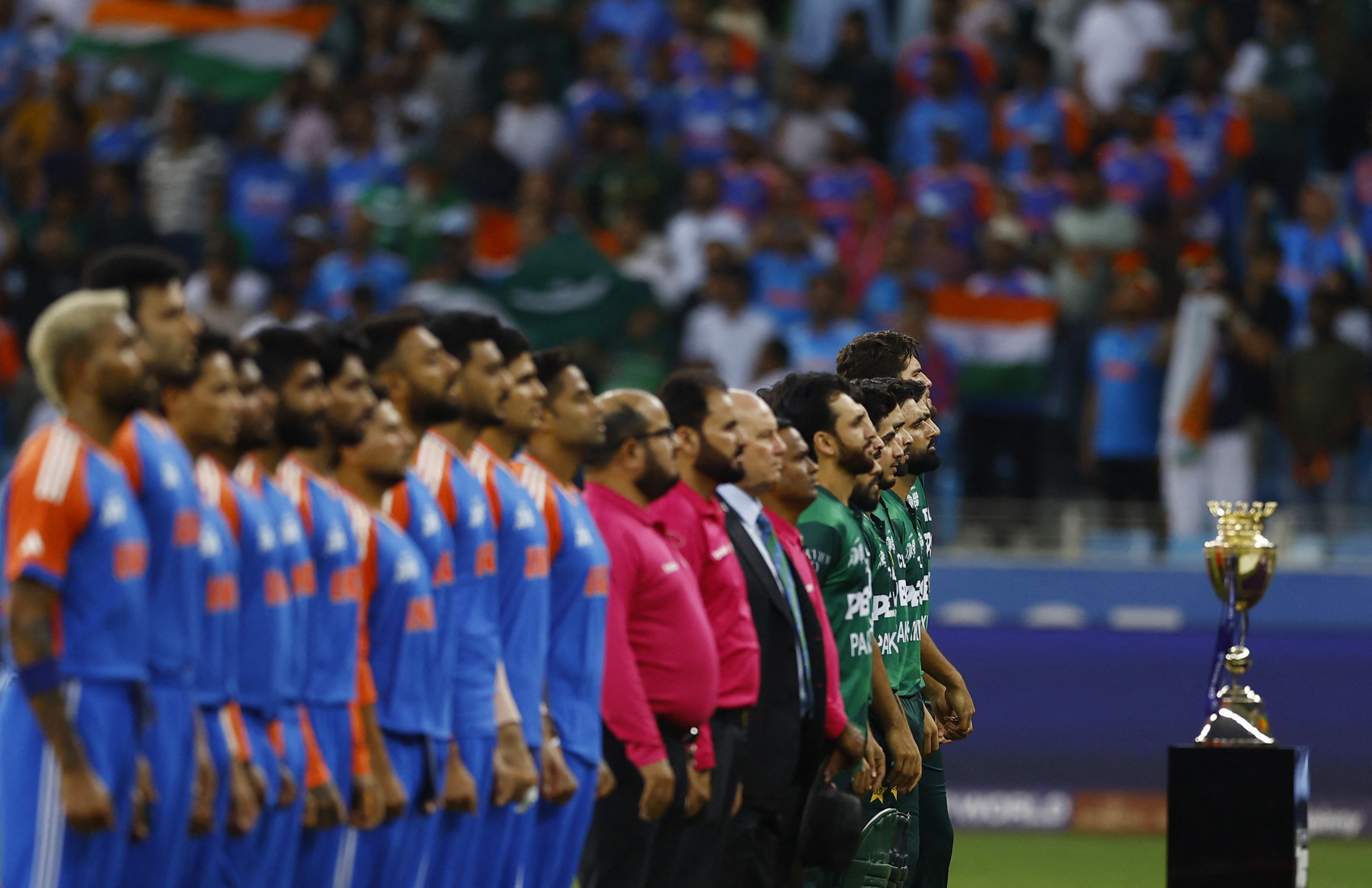Pakistan and India players line up before the Super Fours match at the Asia Cup