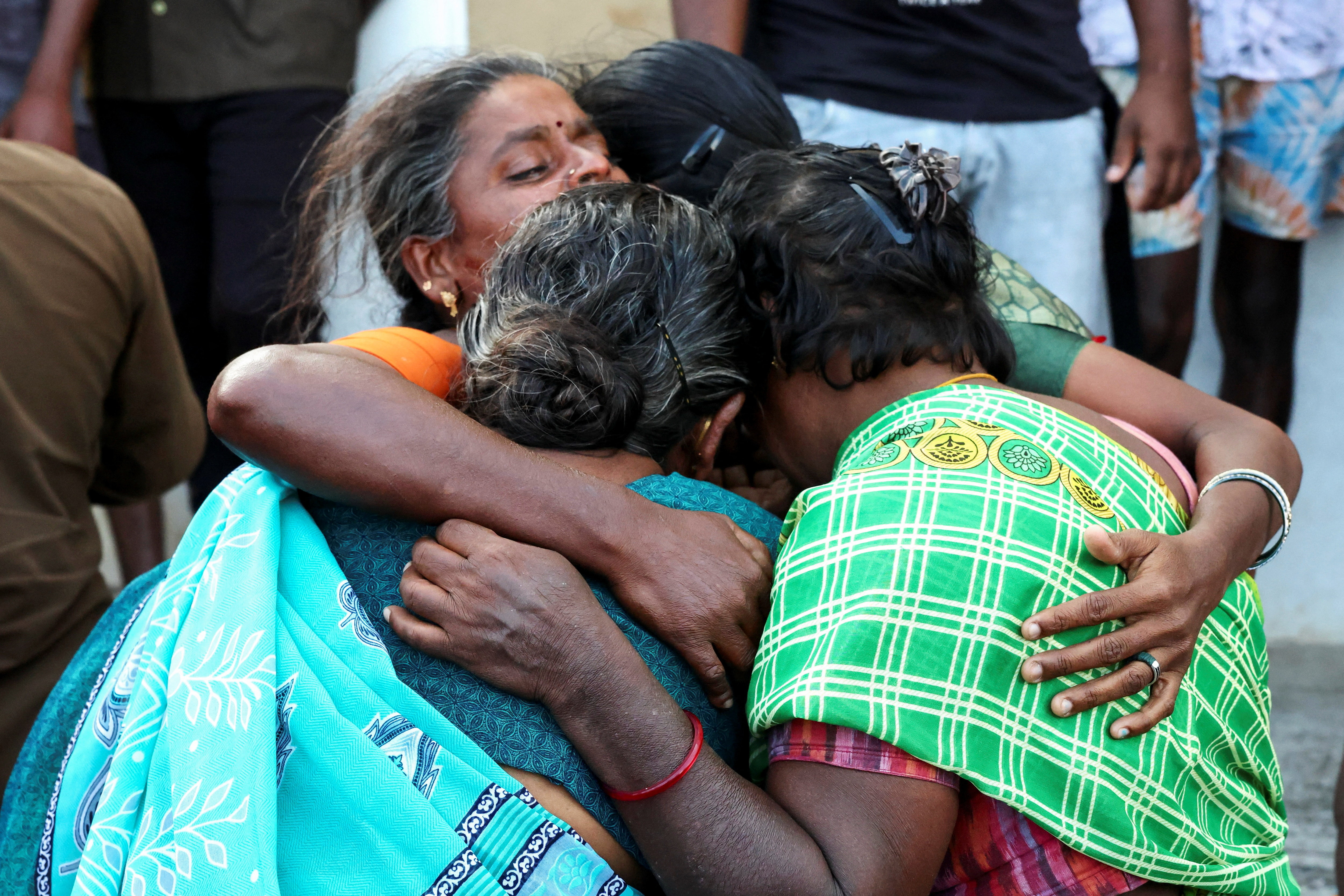 Relatives of the victims mourn in front of Karur Government Medical College hospital following a stampede incident at a election campaign rally held by Tamilaga Vettri Kazhagam party, in Karur district of Tamil Nadu, India, September 28, 2025. REUTERS/Priyanshu Singh