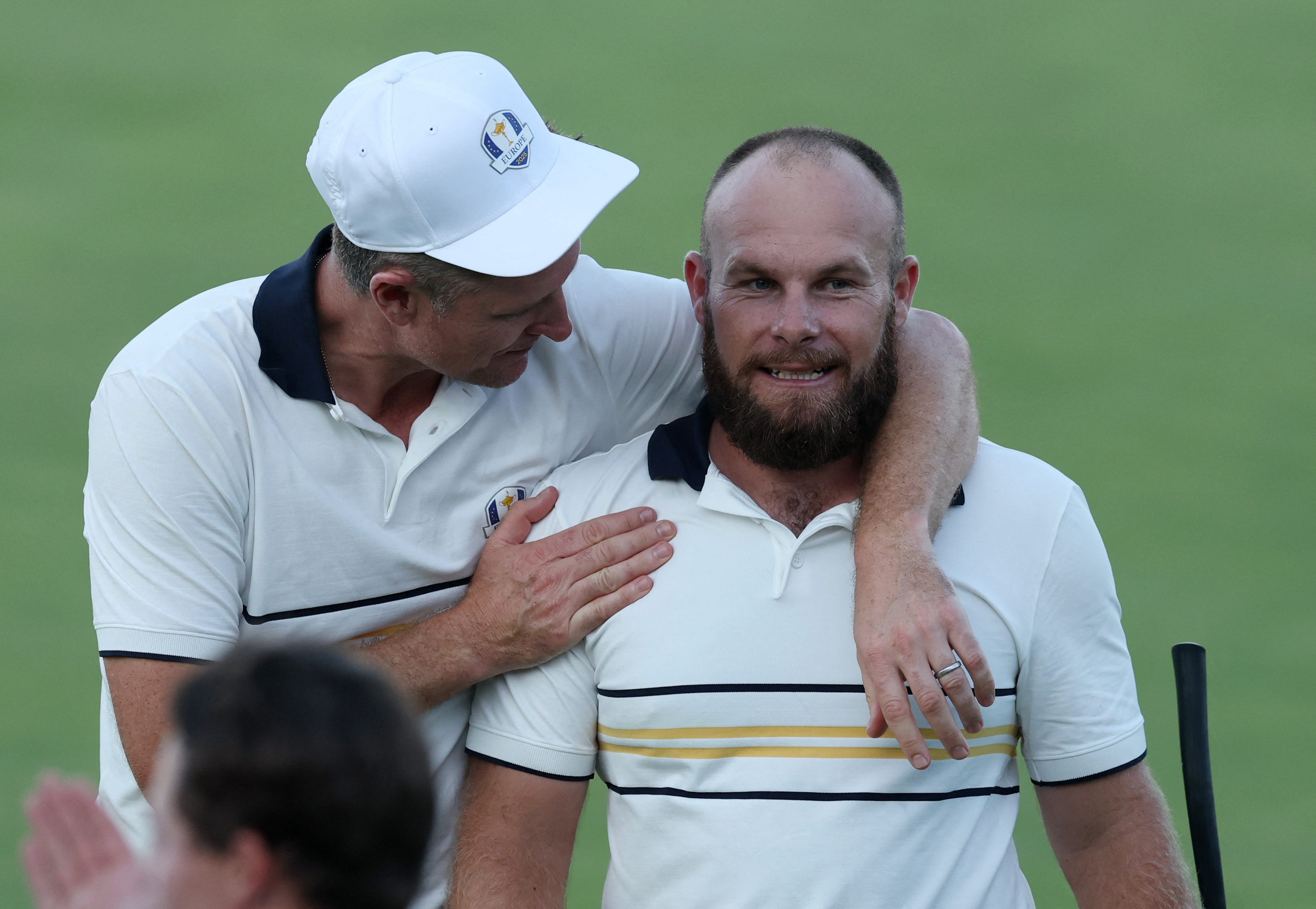 Tyrrell Hatton and Justin Rose react.
