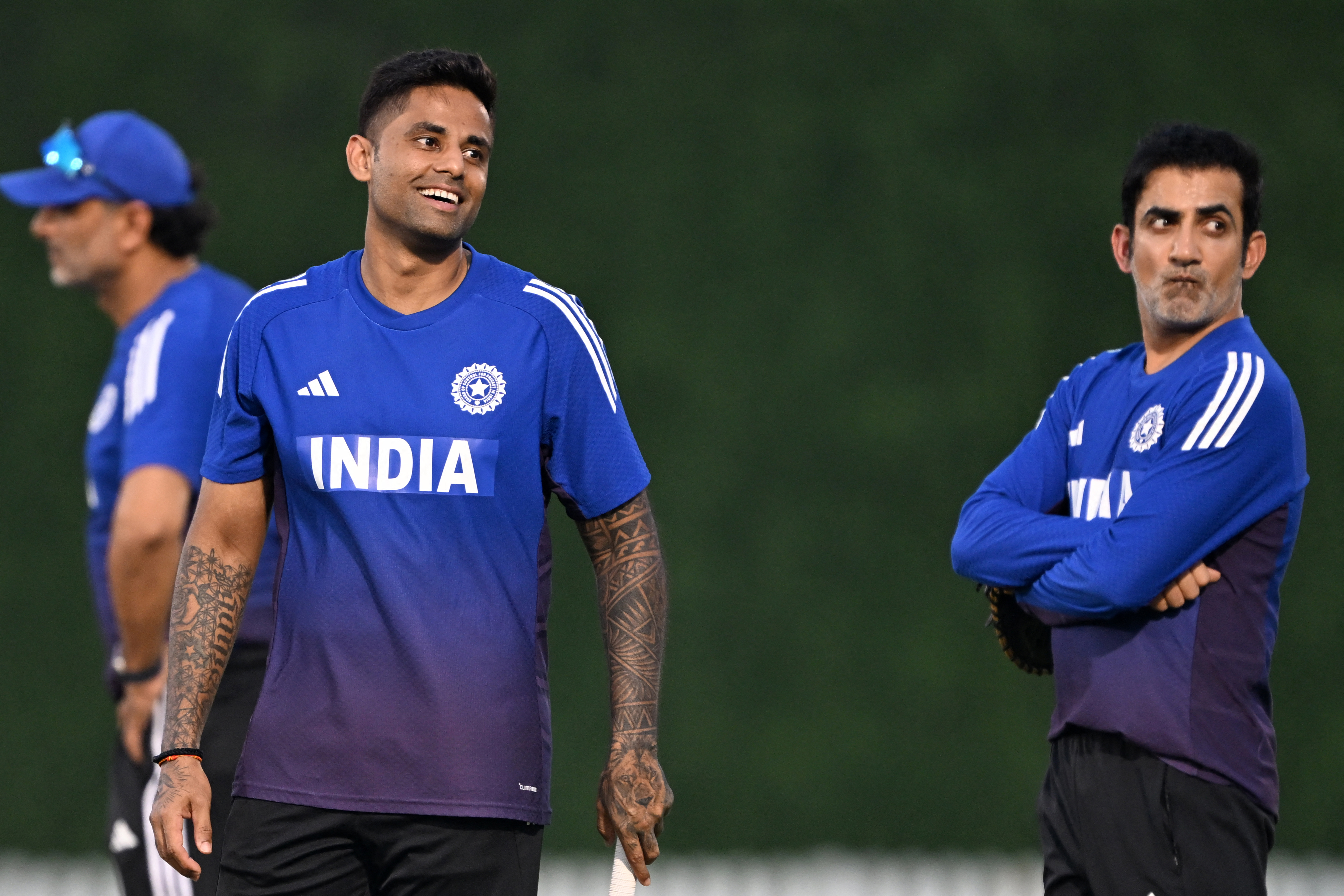 India's captain Suryakumar Yadav (L) and head coach Gautam Gambhir attend a practice session at the International Cricket Council (ICC) Academy in Dubai on September 9, 2025, on the eve of their Asia Cup 2025 Twenty20 international cricket match against United Arab Emirates. (Photo by Sajjad HUSSAIN / AFP)