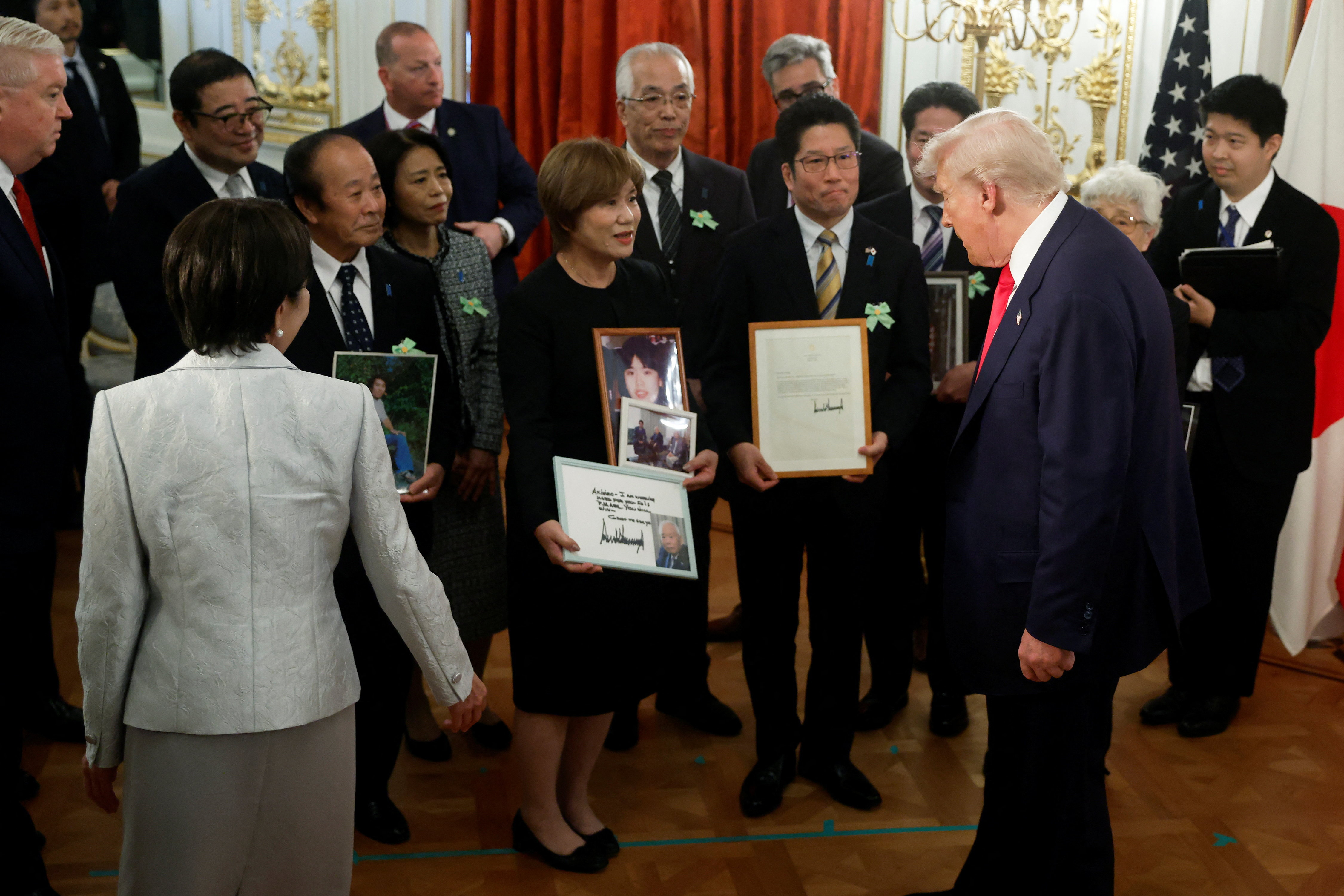 US President Donald Trump and Sanae Takaichi, Japan's prime minister, during a meeting with relatives of Japanese nationals abducted by North Korea, at the Akasaka Palace state guest house in Tokyo, Japan, on Tuesday, October 28, 2025. Kiyoshi Ota/Pool via REUTERS