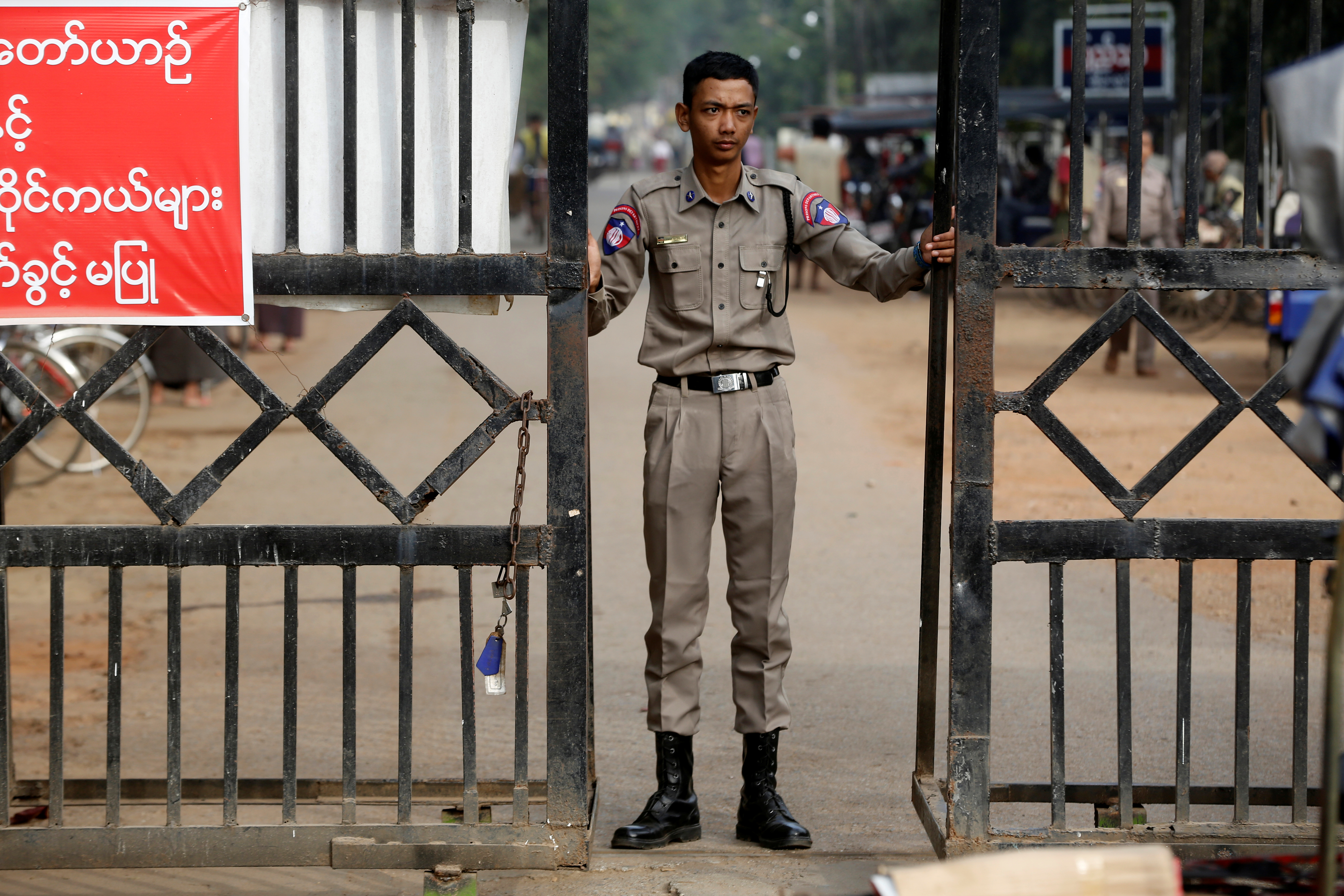 A prison staff stands guard at Insein prison in Yangon, Myanmar, January 3, 2019. REUTERS/Ann Wang