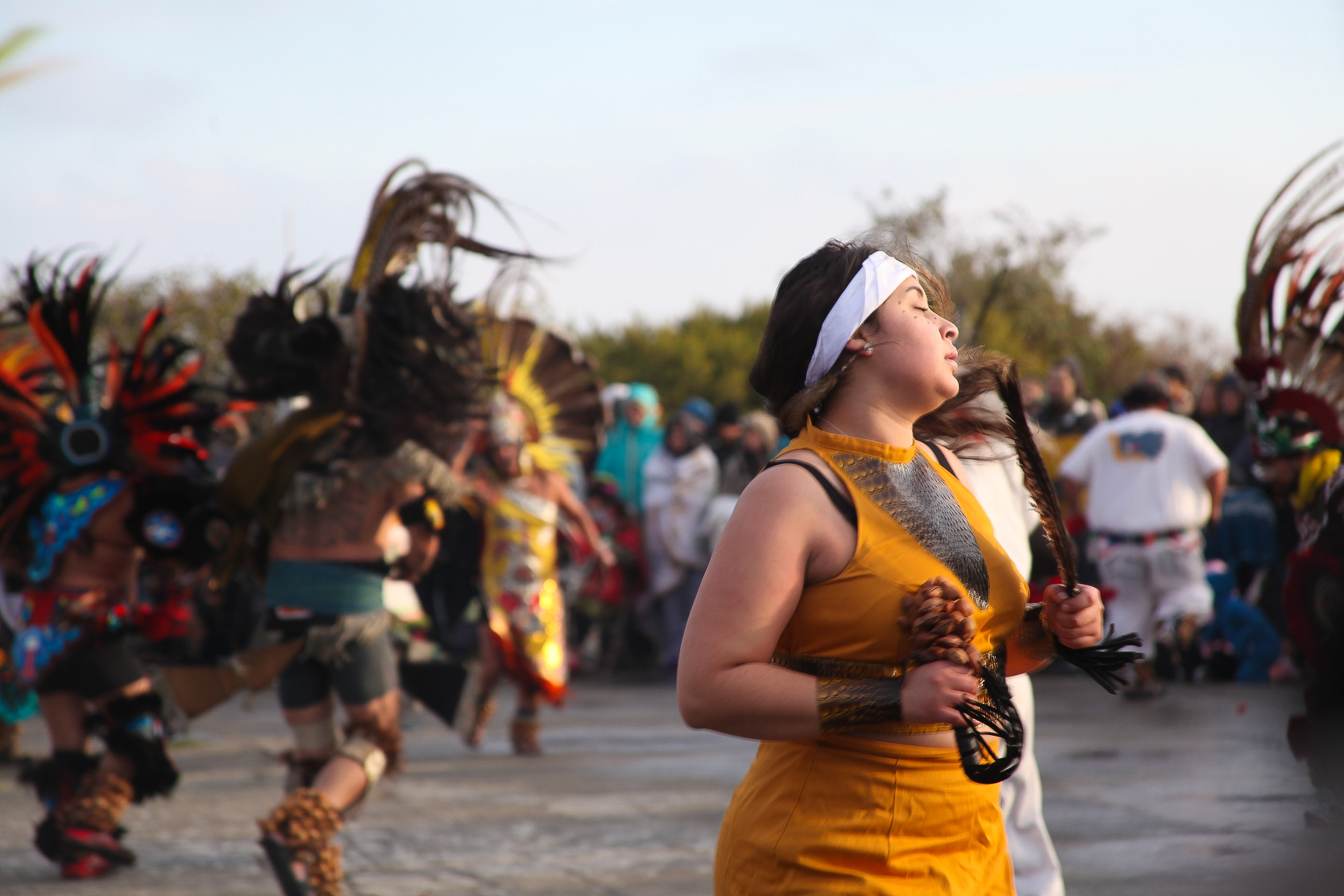 Indigenous dancers perform on the parade grounds of Alcatraz Island in November 2019