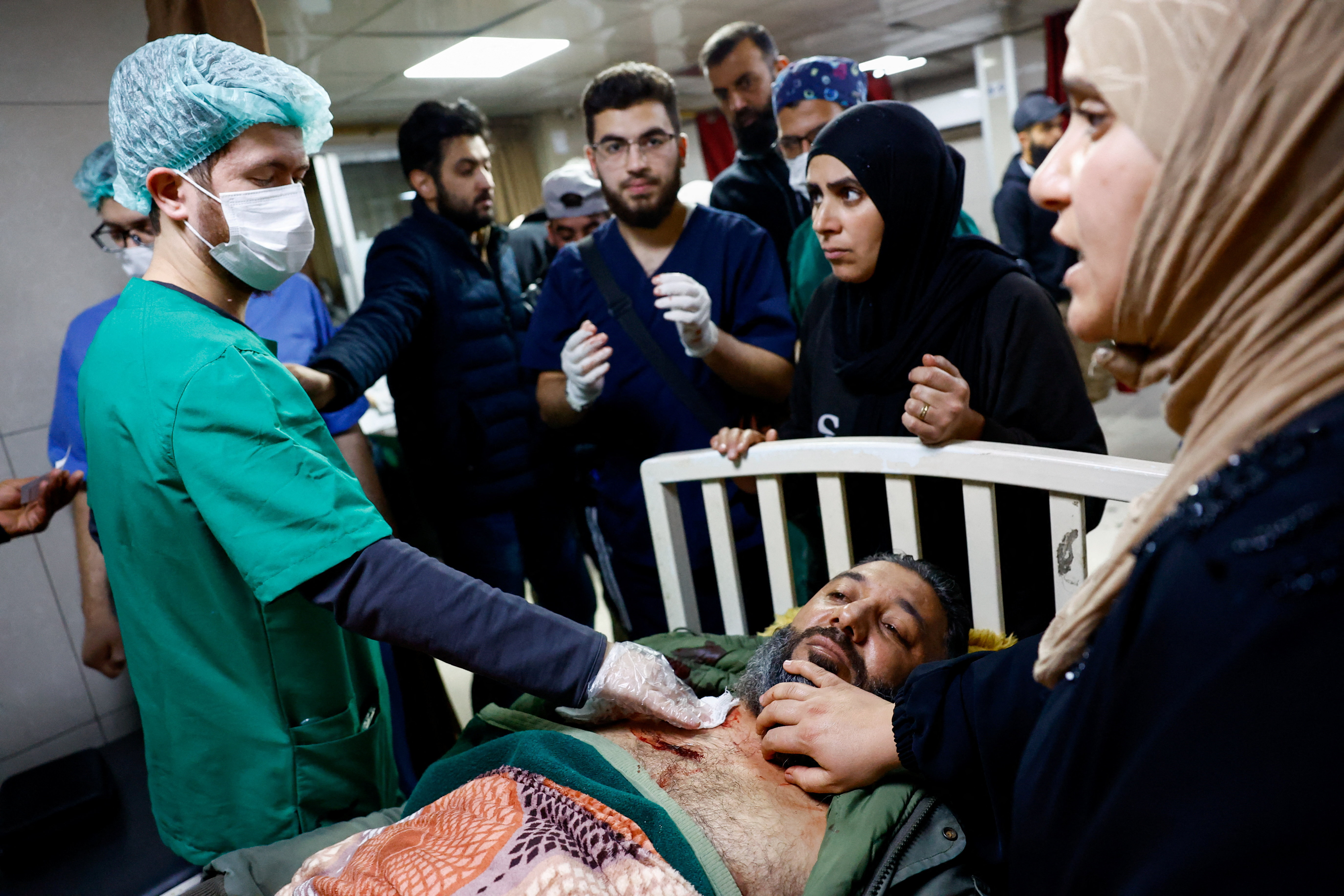A casualty receives medical treatment inside a hospital, following an Israeli raid in the Beit Jinn area of southern Syria, according to Syrian state media, in Damascus, Syria, November 28, 2025. REUTERS/Yamam al Shaar