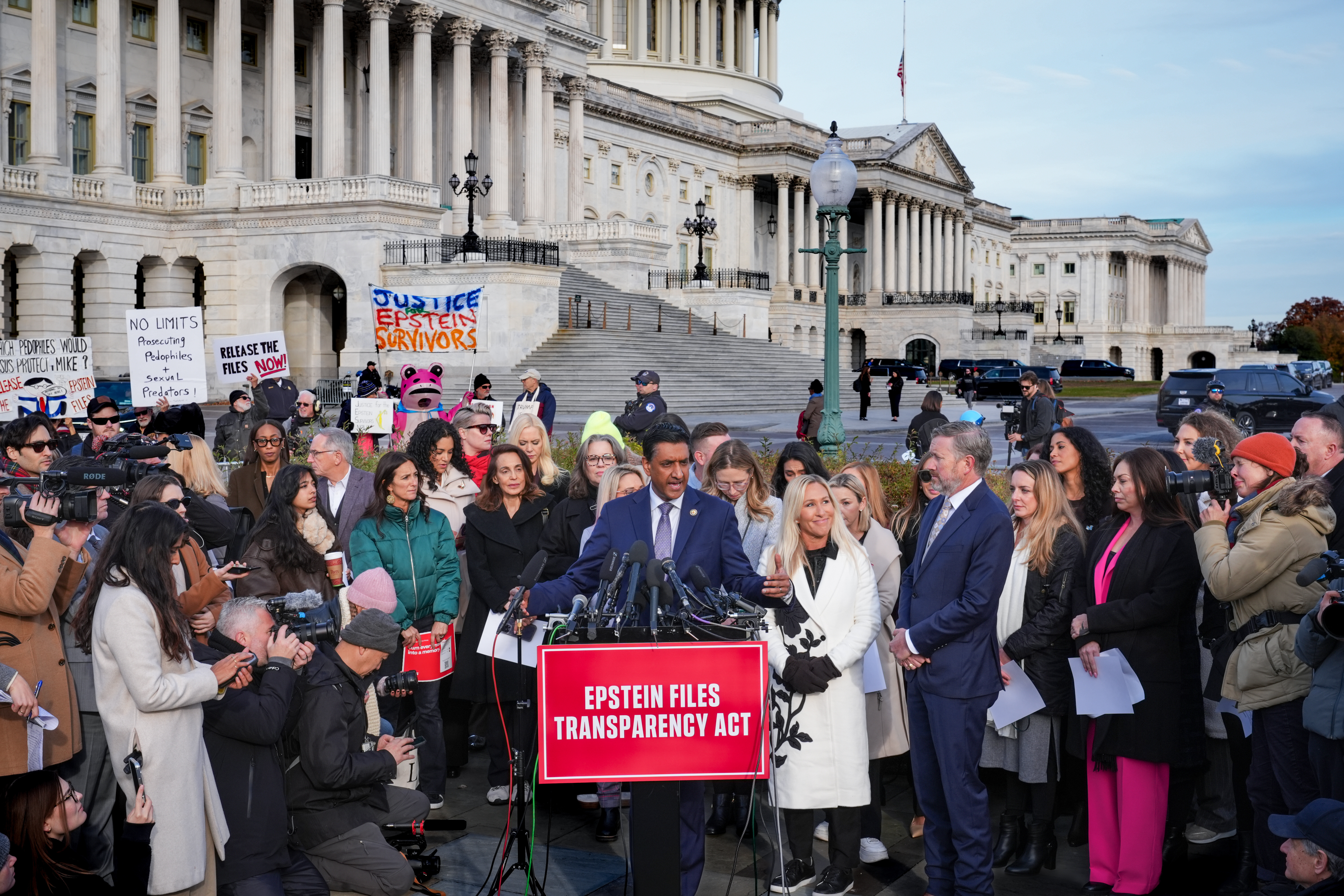 Ro Khanna speaks alongside Epstein survivors on the Capitol steps.