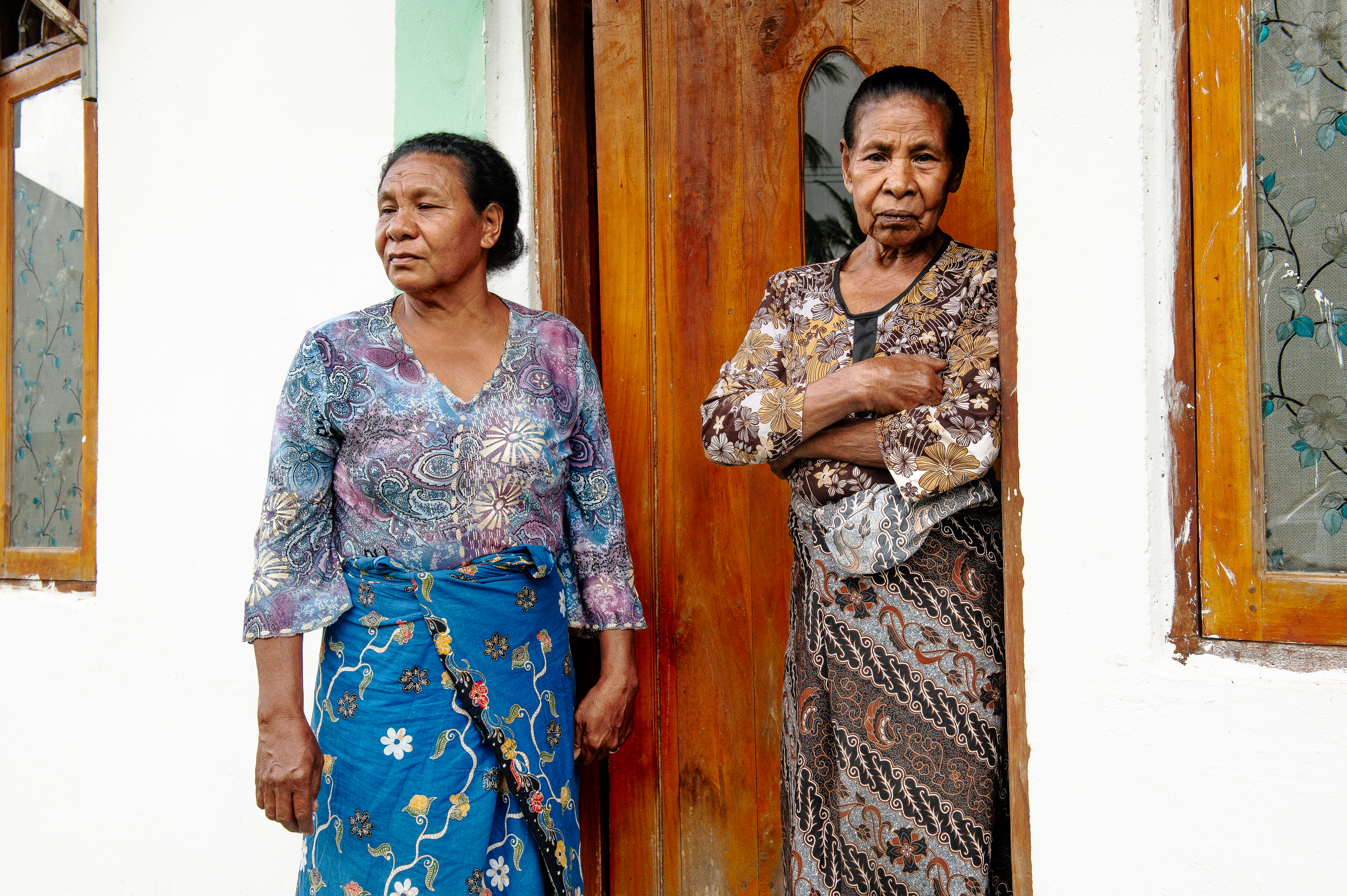 Berta dos Santos and her mother Helena dos Santos outside their home in Lospalos . Both suffered extreme sexual violence committed by Indonesian soldiers during 24 years of occupation. 