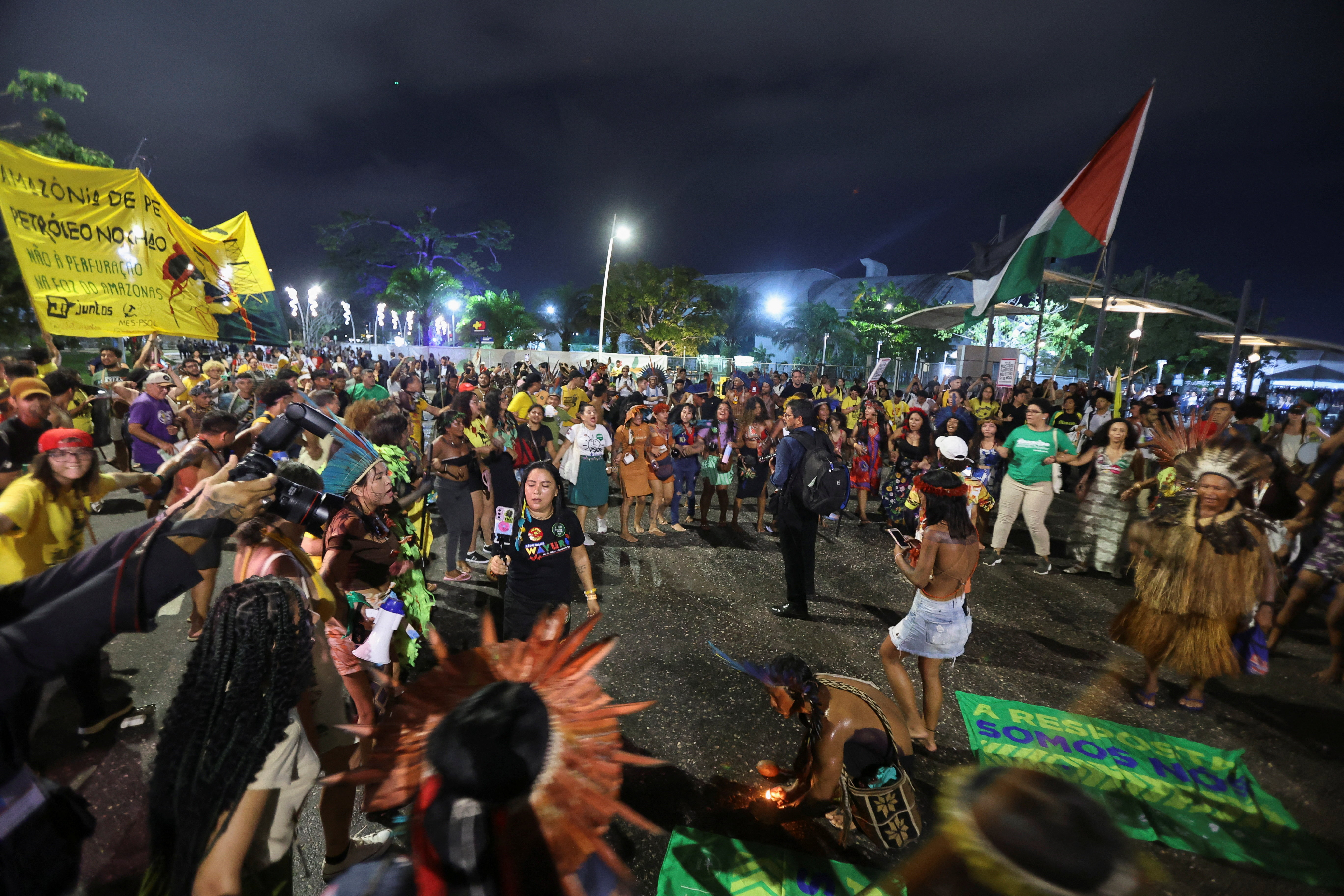 Protesters, including Indigenous people, participate in a demonstration on the sidelines of the UN Climate Change Conference (COP30), in Belém, Brazil, November 11, 2025. REUTERS/Anderson Coelho