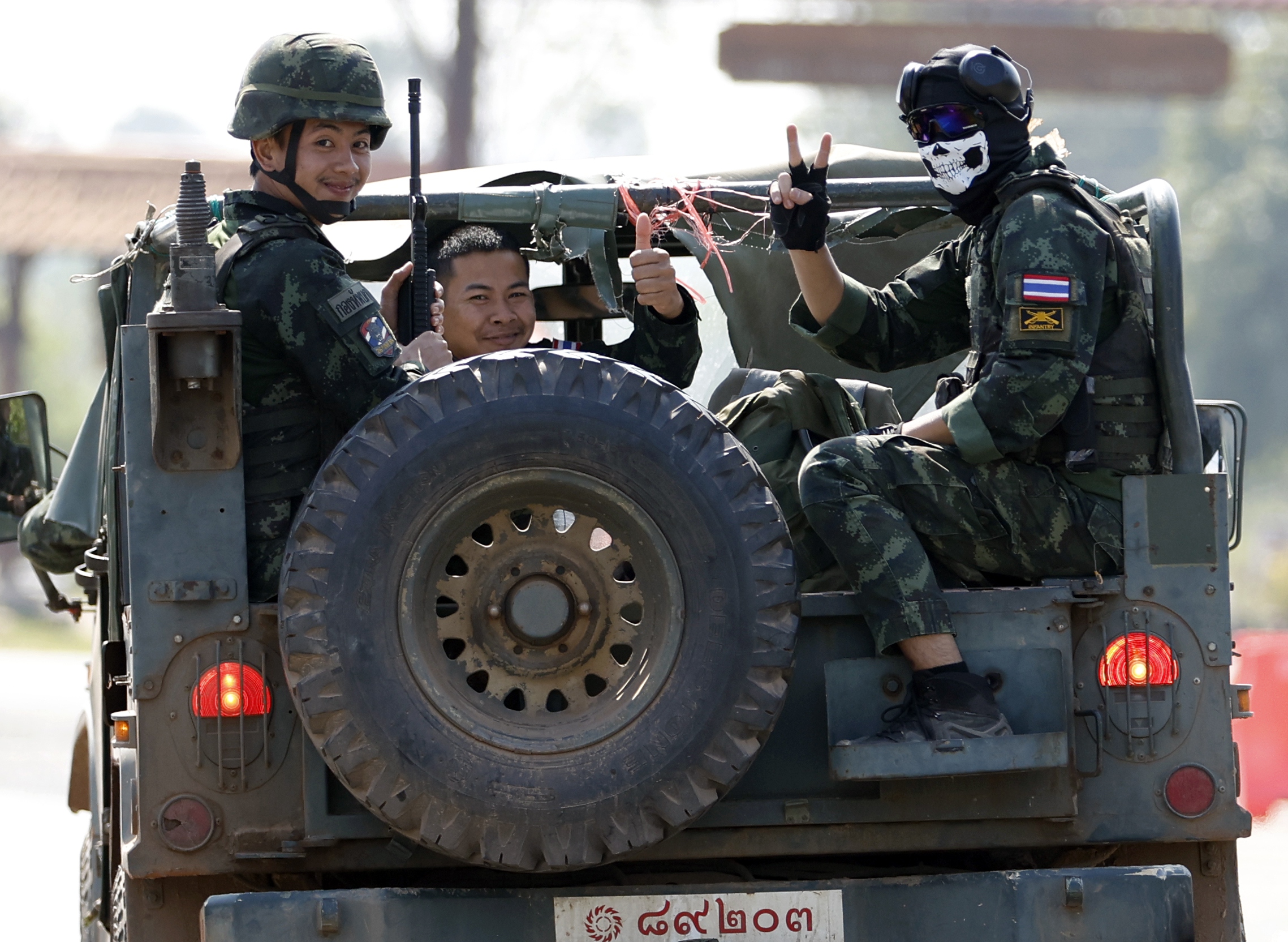 Thai soldiers on a military vehicle as they patrol in Phanom Dong Rak district, Surin province, Thailand, on Tuesday