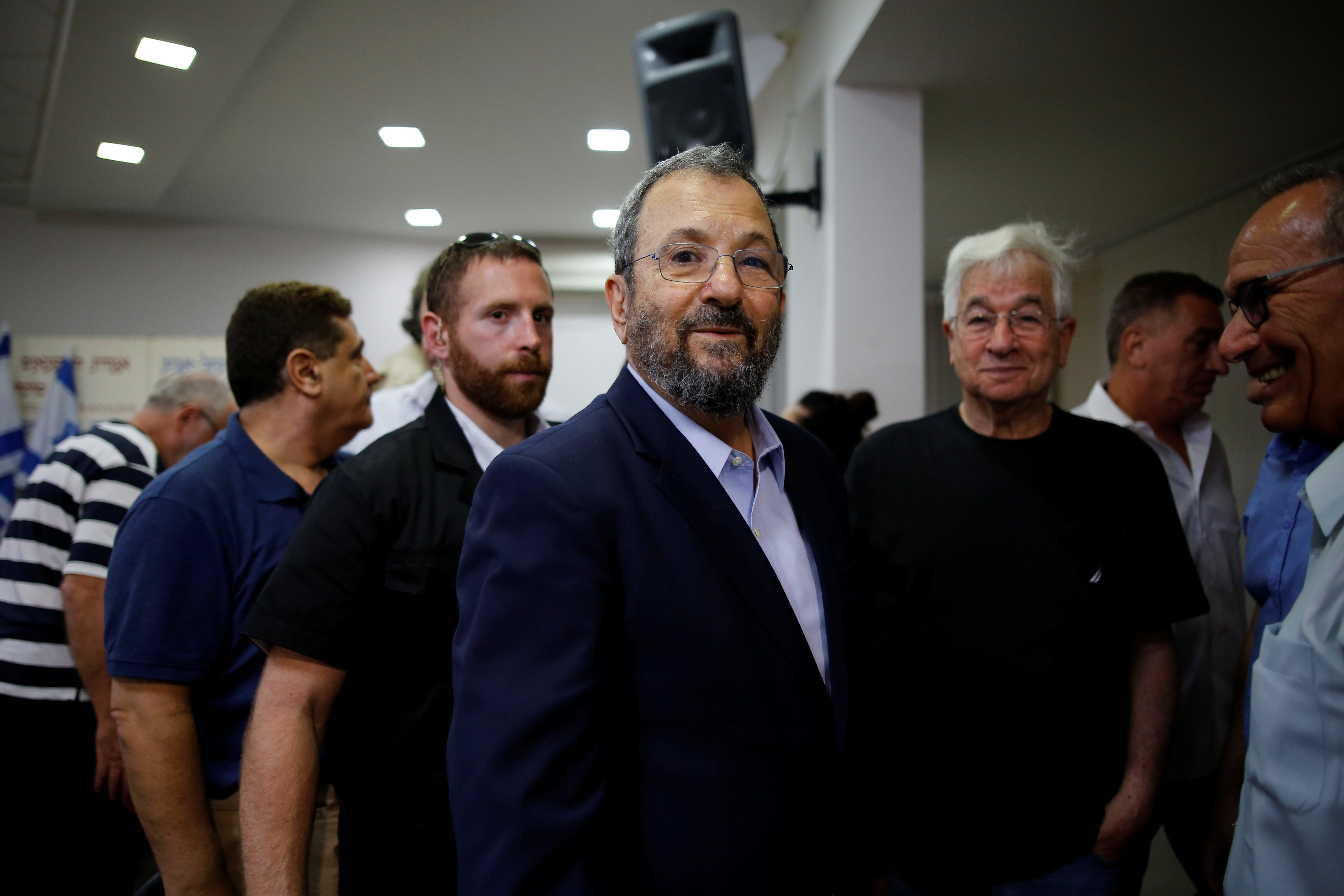 Former Israeli Prime Minister Ehud Barak leaves after delivering a statement.
