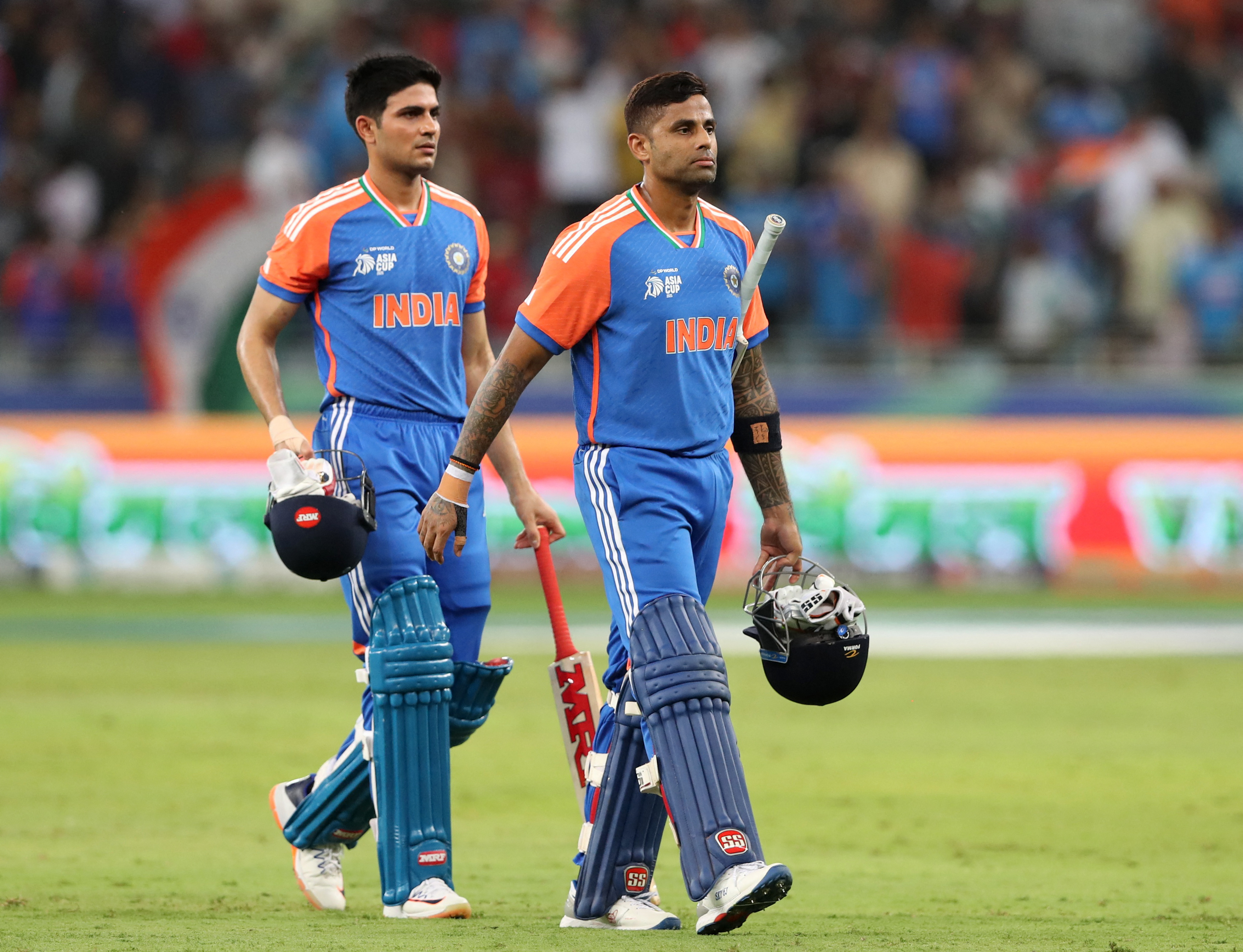 India's Shubman Gill and Suryakumar Yadav on the field.
