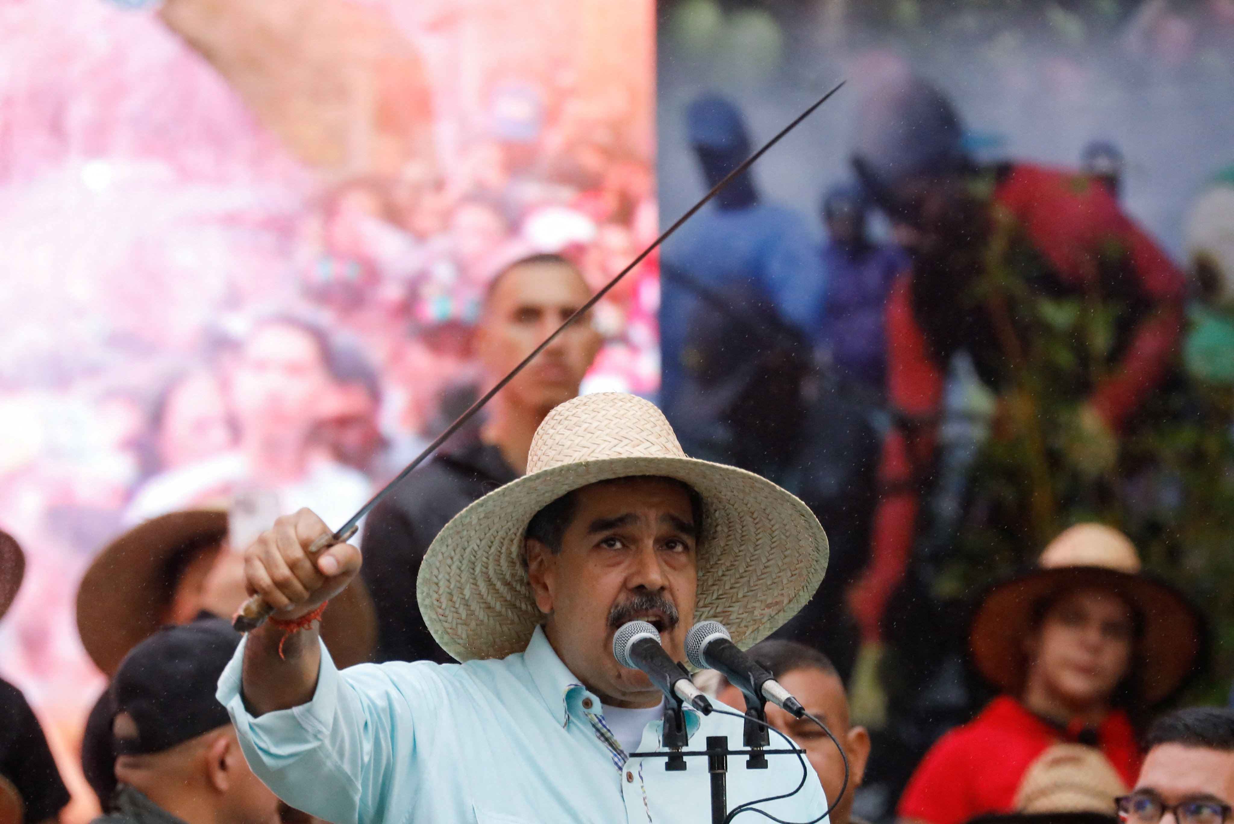 Venezuela’s President Nicolas Maduro holds a sword which belonged to Ezequiel Zamora, a Venezuelan soldier