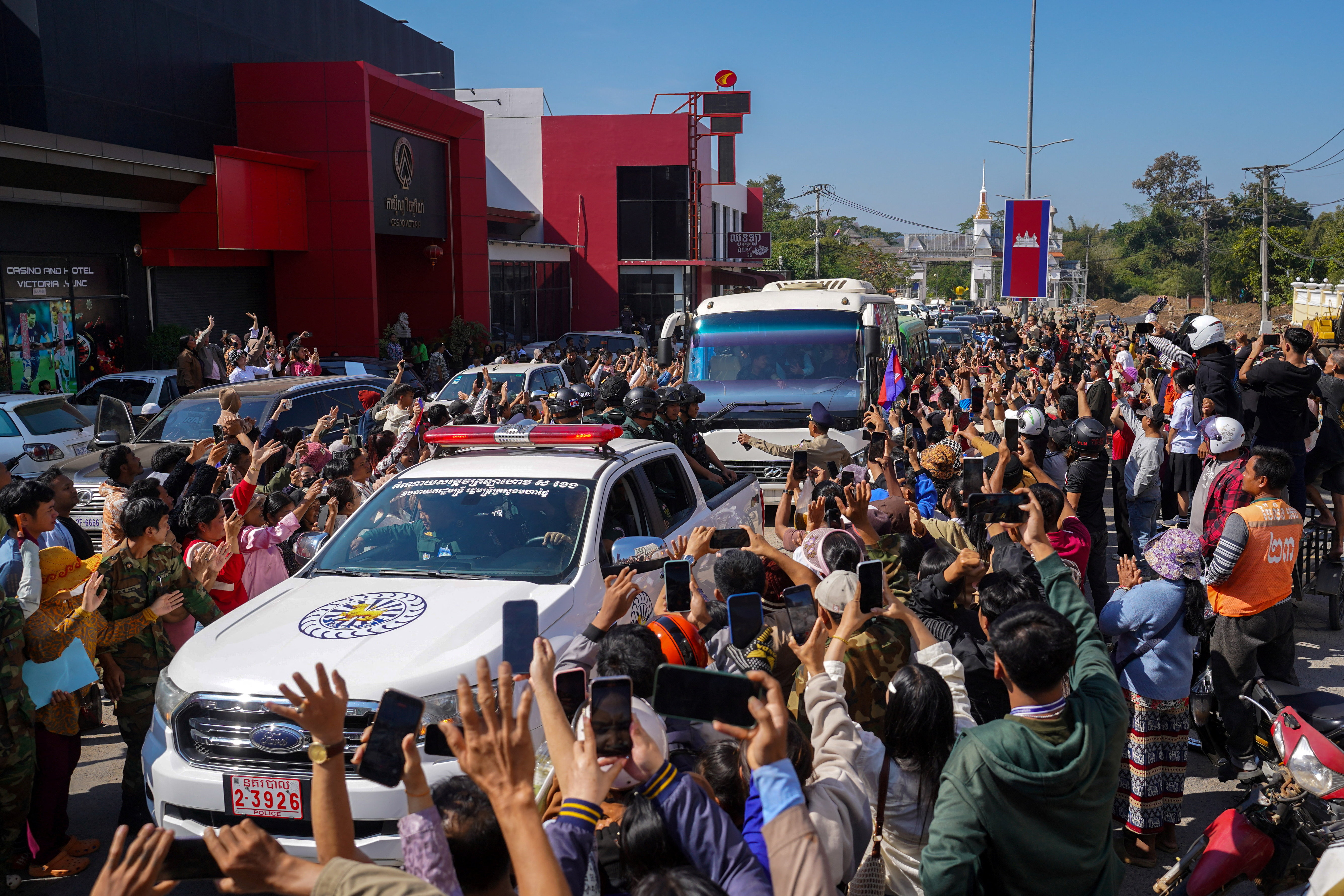 A bus carries 18 Cambodian soldiers repatriated from Thailand after being captured in July, following their release under the terms of a ceasefire agreement signed on December 27, 2025, at Prum International Border Checkpoint in Pailin province, Cambodia, December 31, 2025. REUTERS/Soveit Yarn