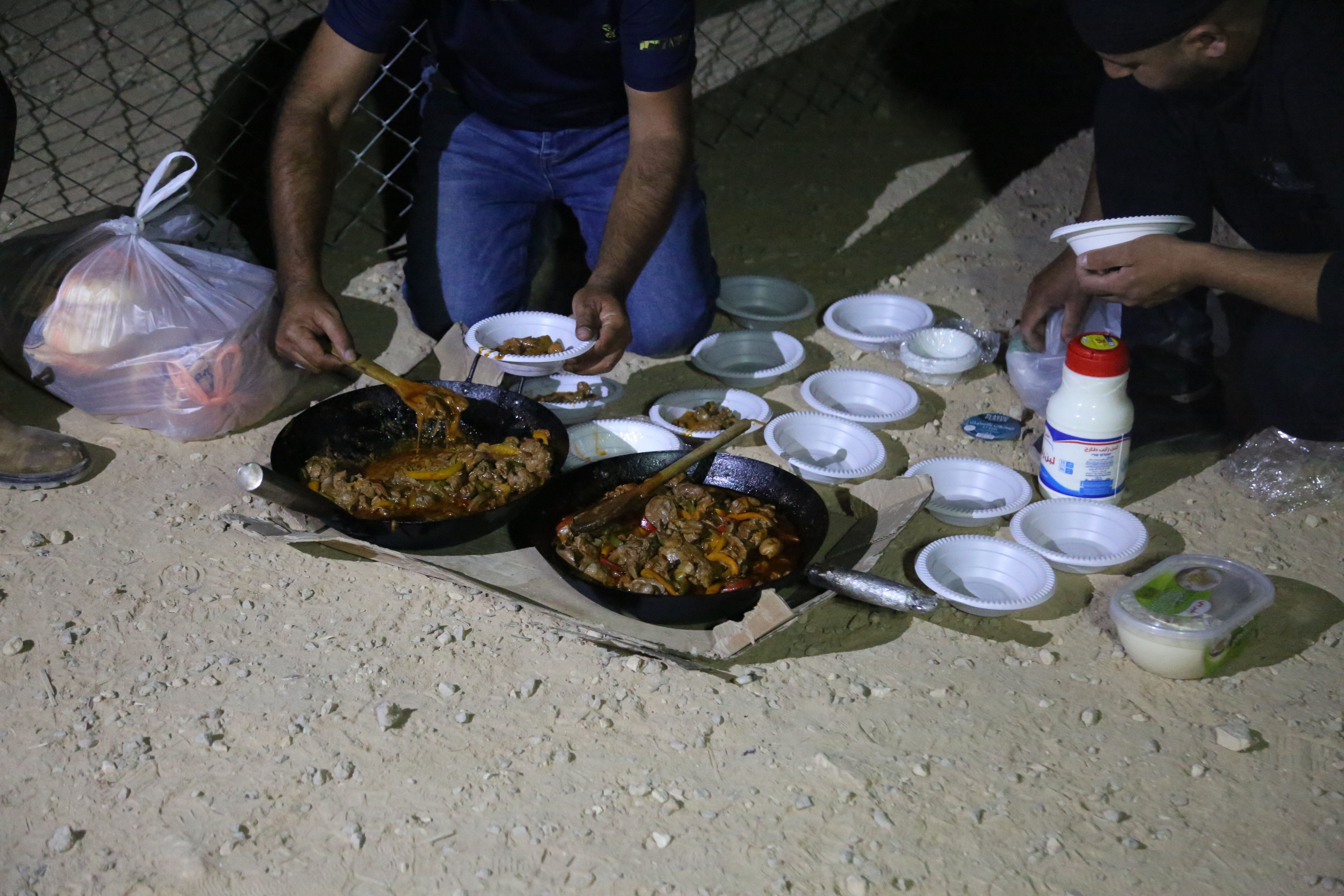 Some of the guardians are in charge of preparing food for the group, to keep everyone going all night