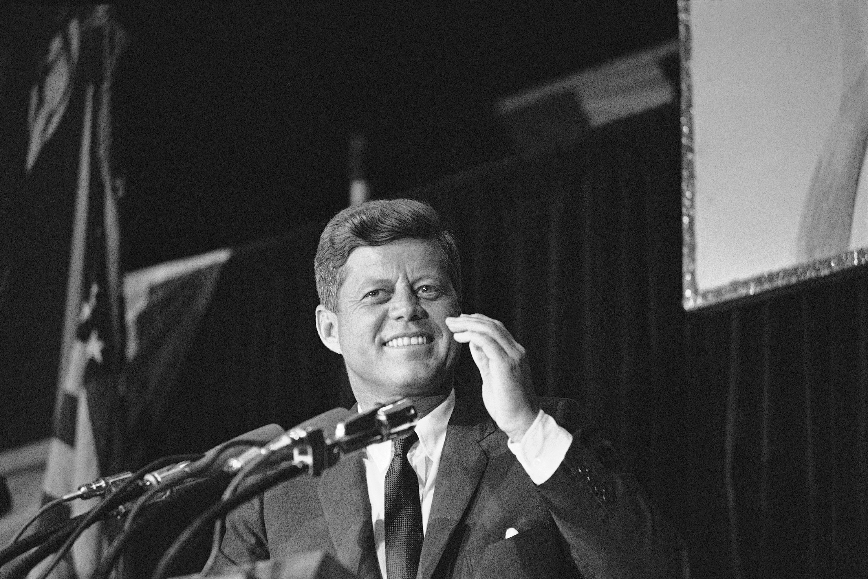 A smile lights the face of President John F. Kennedy as he is cheered during his speech to a big Democratic Party rally in Milwaukee, May 12, 1962, a $100 a plate Jefferson-Jackson Day dinner. The president told the crowd that we cannot permit this country to stand still. (AP Photo)
