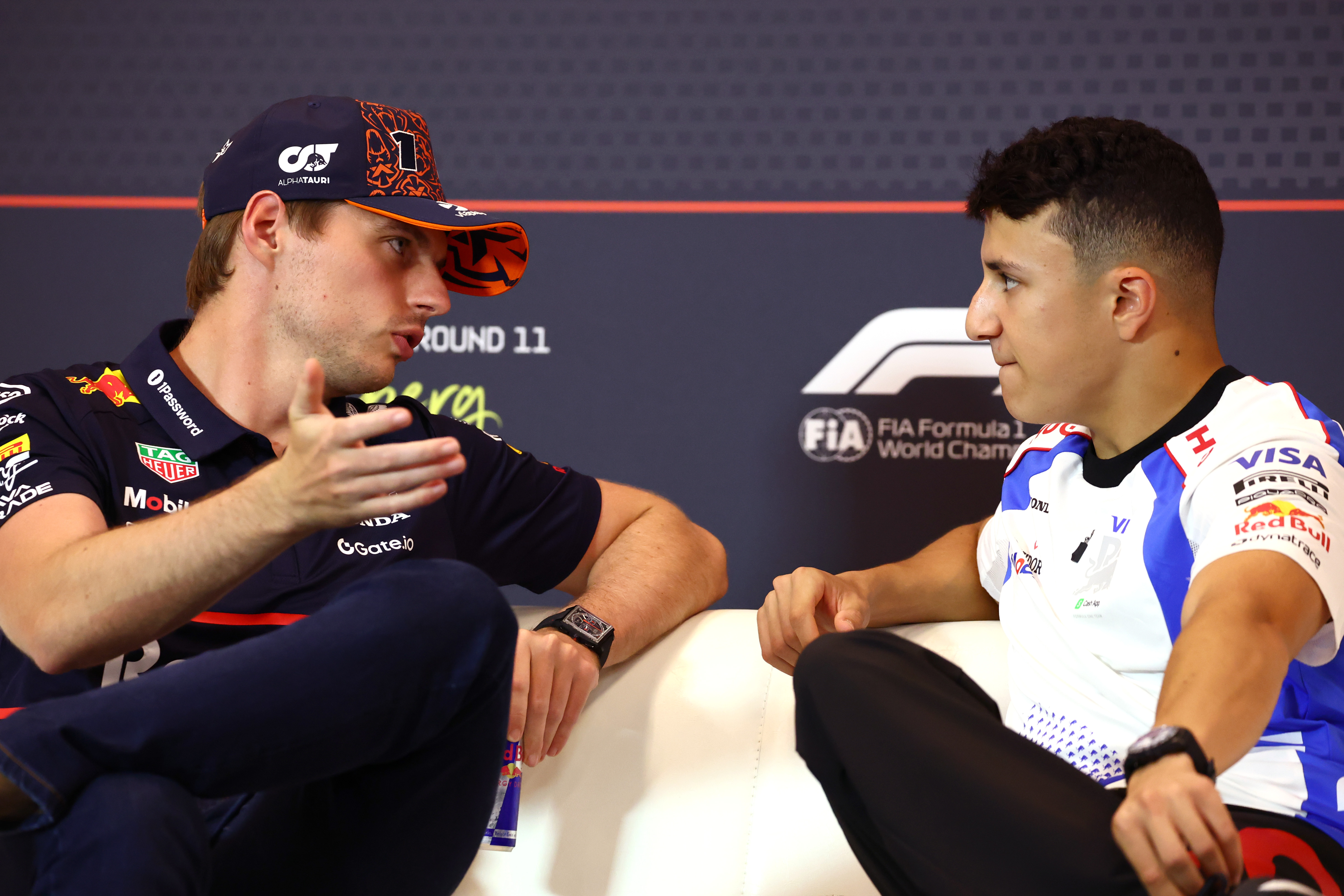 Max Verstappen and Isack Hadjar react.