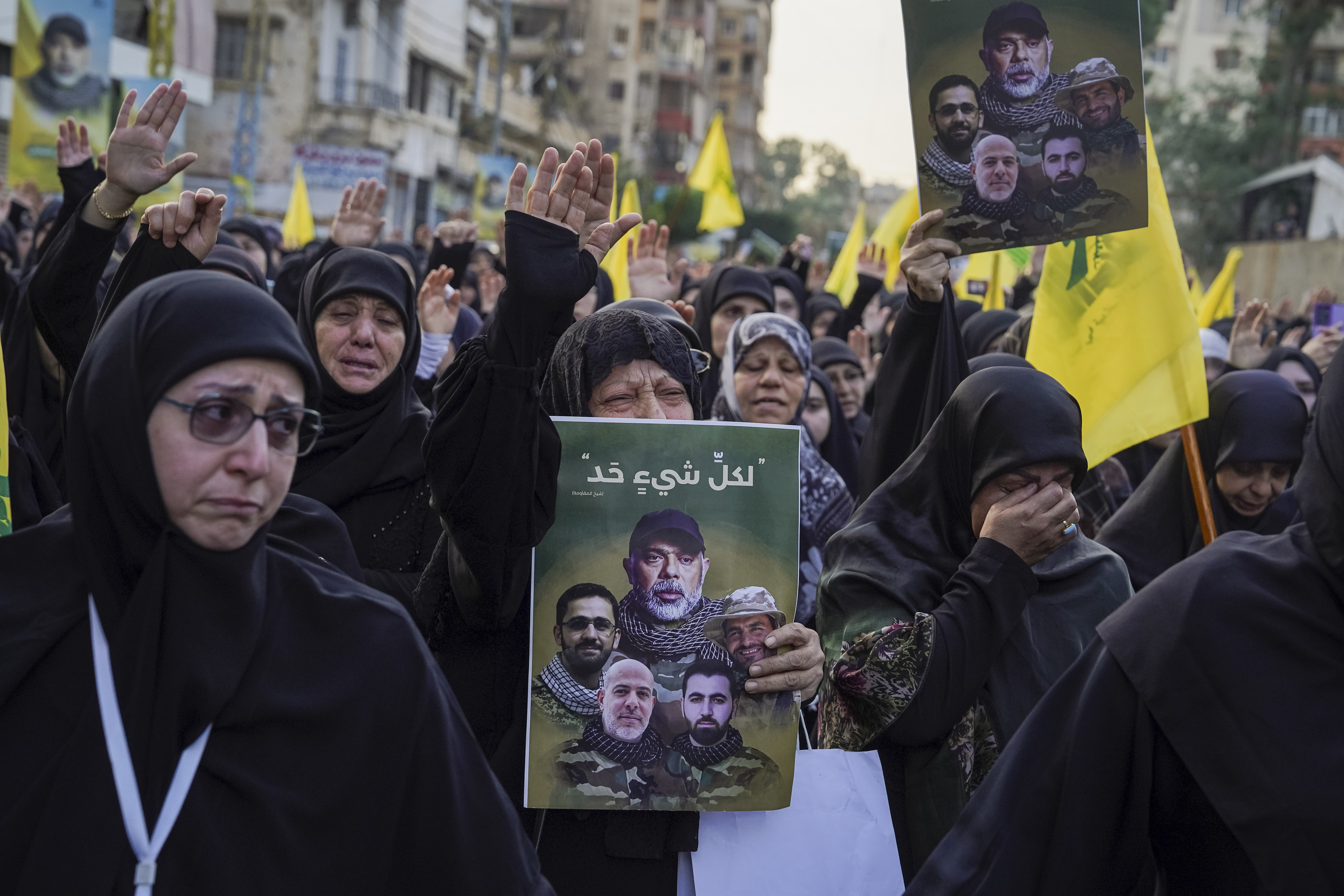BEIRUT, LEBANON - NOVEMBER 24: Women Hezbollah members mourning during the funeral procession on November 24, 2025 in Beirut, Lebanon. Hezbollah confirmed that its top military commander Haytham Ali Tabatabai was killed yesterday in an Israeli air strike on Lebanon's capital, Beirut. The attack on an apartment block in Dahiyeh killed at least five people, including Tabatabai who was the chief of staff of Hezbollah's armed wing. (Photo by Adri Salido/Getty Images)
