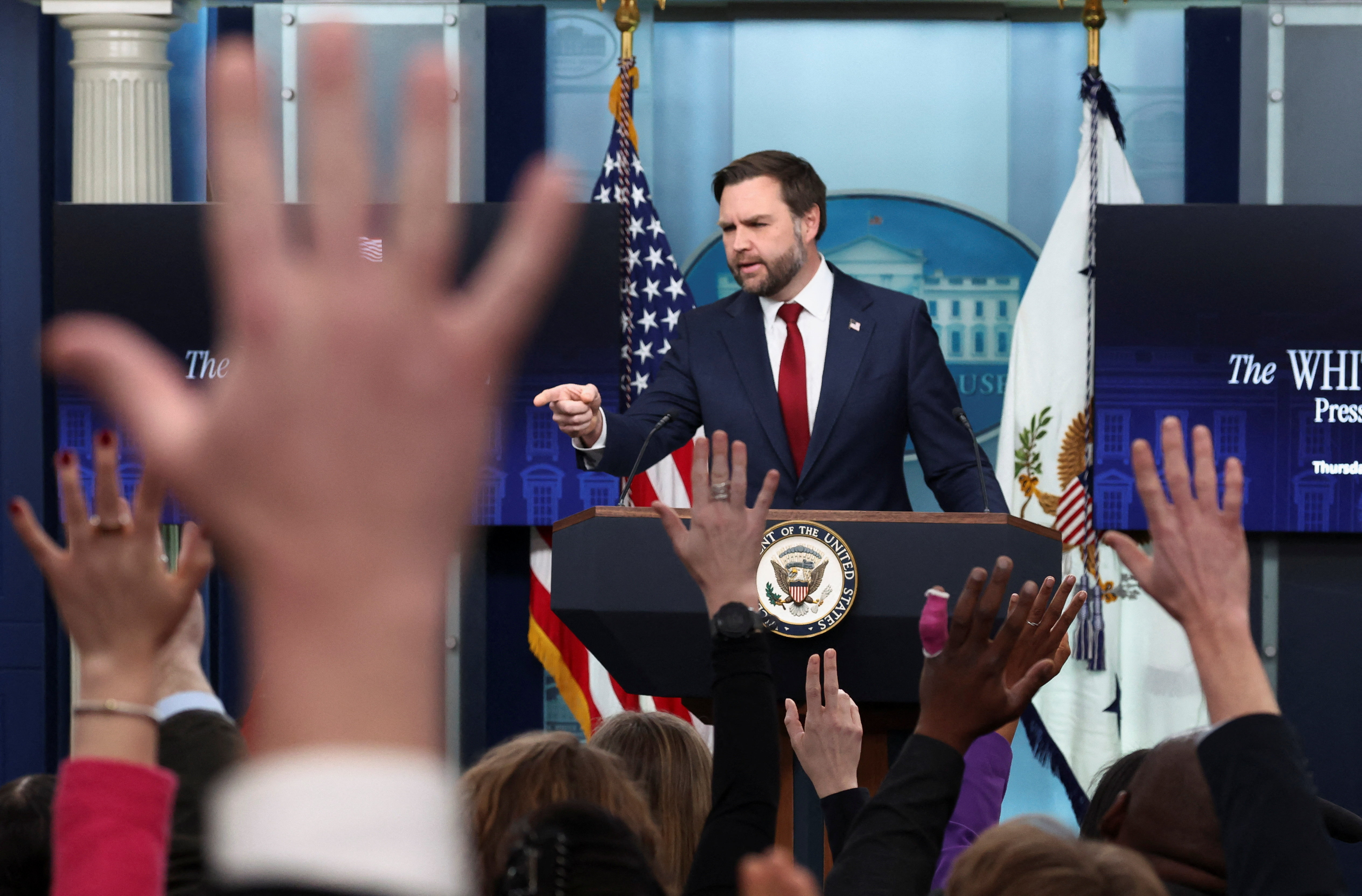 JD Vance speaks to reporters
