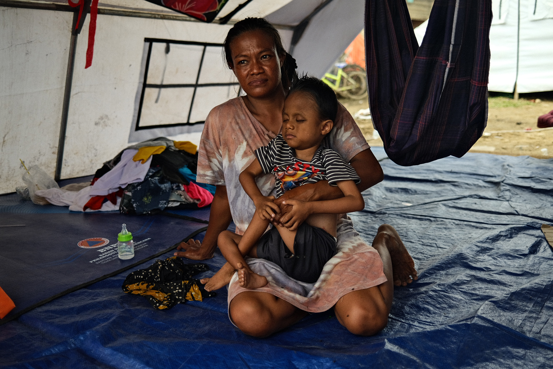 Rahmadani and her son Dimas.