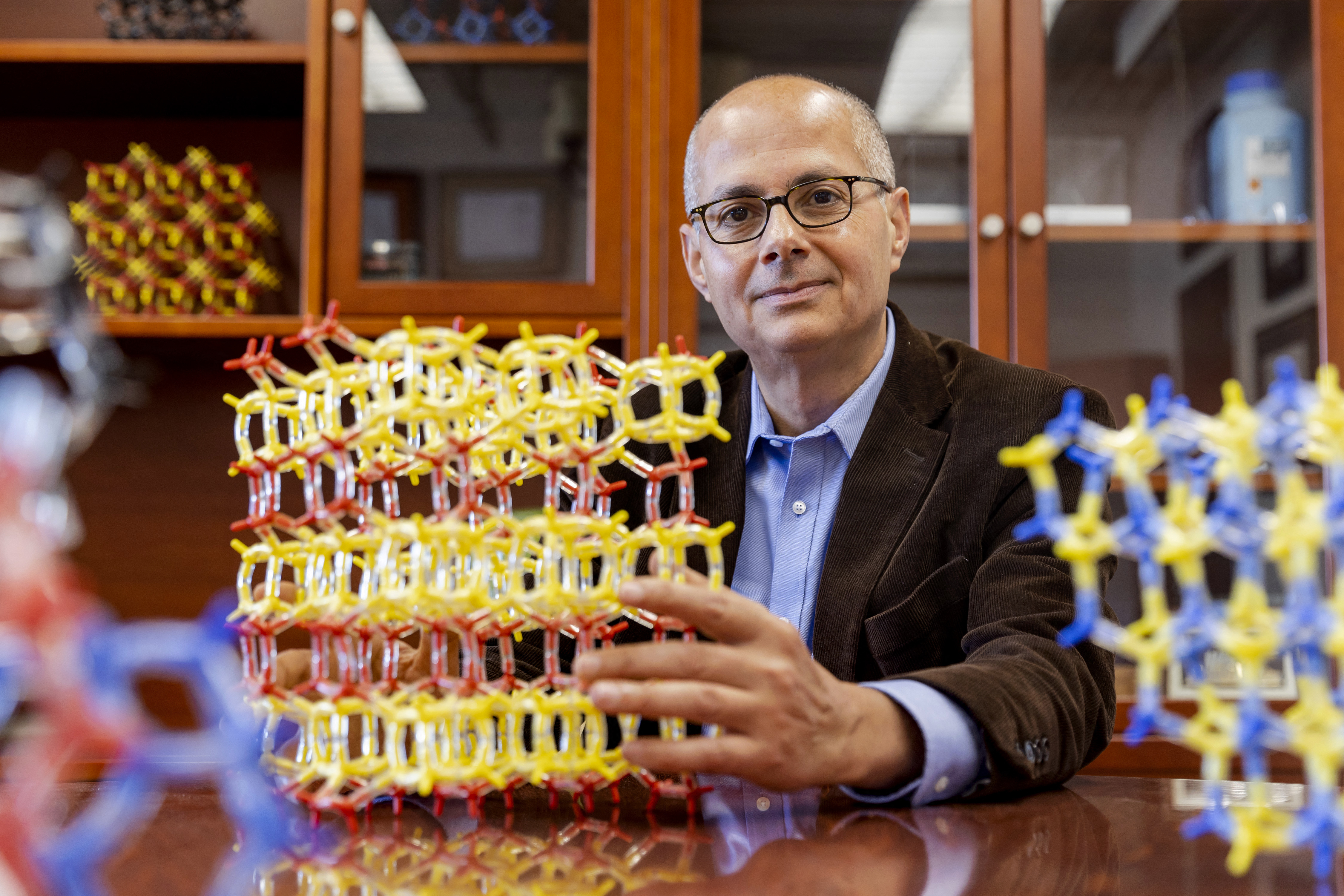 This photo taken on September 30, 2022 and released on October 8, 2025 by the University of California in Berkeley, USA, shows US-Jordanian chemist Omar Yaghi posing for a photo at the university in Berkeley. Three scientists on October 8, 2025 won the Nobel Prize in Chemistry for developing metalorganic frameworks (MOFs) that can be used to capture carbon dioxide and harvest water from desert air, among other things. [Photo by Brittany Hosea-Small / University of California, Berkeley / AFP]