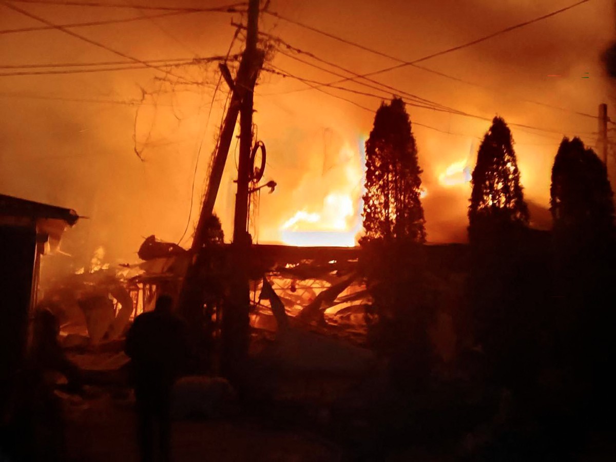 This handout photo released by Russia-appointed governor of the Kherson region, Vladimir Saldo, shows the site of a drone attack on a hotel in Khroly on January 1, 2026. Russia on Thursday said Kyiv was behind a deadly drone strike on a hotel in the Moscow-held part of Ukraine's southern Kherson region that killed at least 20 people celebrating the New Year. The accusations come at a crunch moment in a flurry of talks aimed at brokering peace and ending the near four-year war and as Ukrainian President Volodymyr Zelensky said his country was "10 percent" away from a peace deal. According to a Russia-appointed governor of the Kherson region, Vladimir Saldo, last night three drones "struck a cafe and hotel on the Black Sea coast in Khorly" where "civilians were celebrating the New Year".
