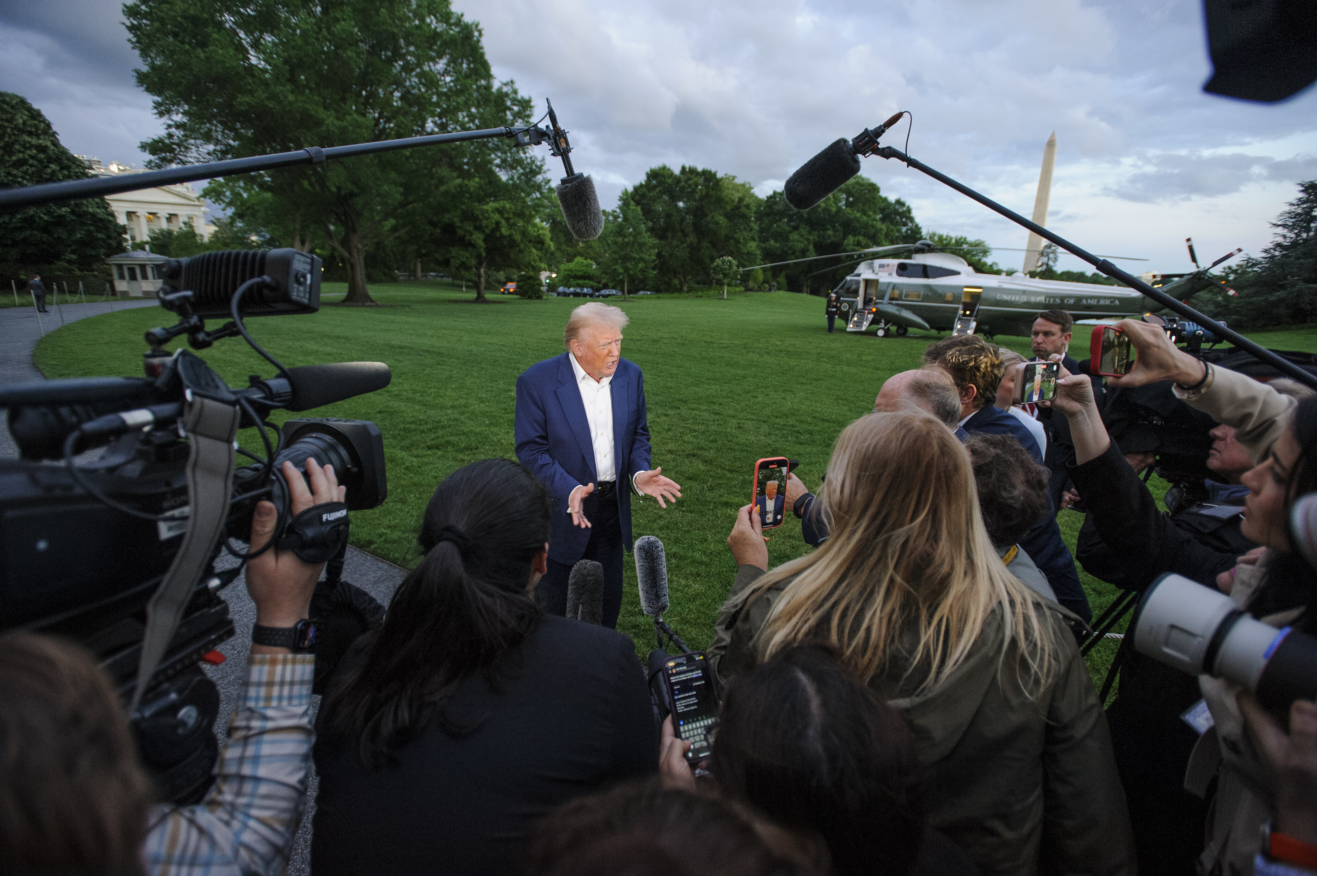 Trump speaks to press on the White House lawn