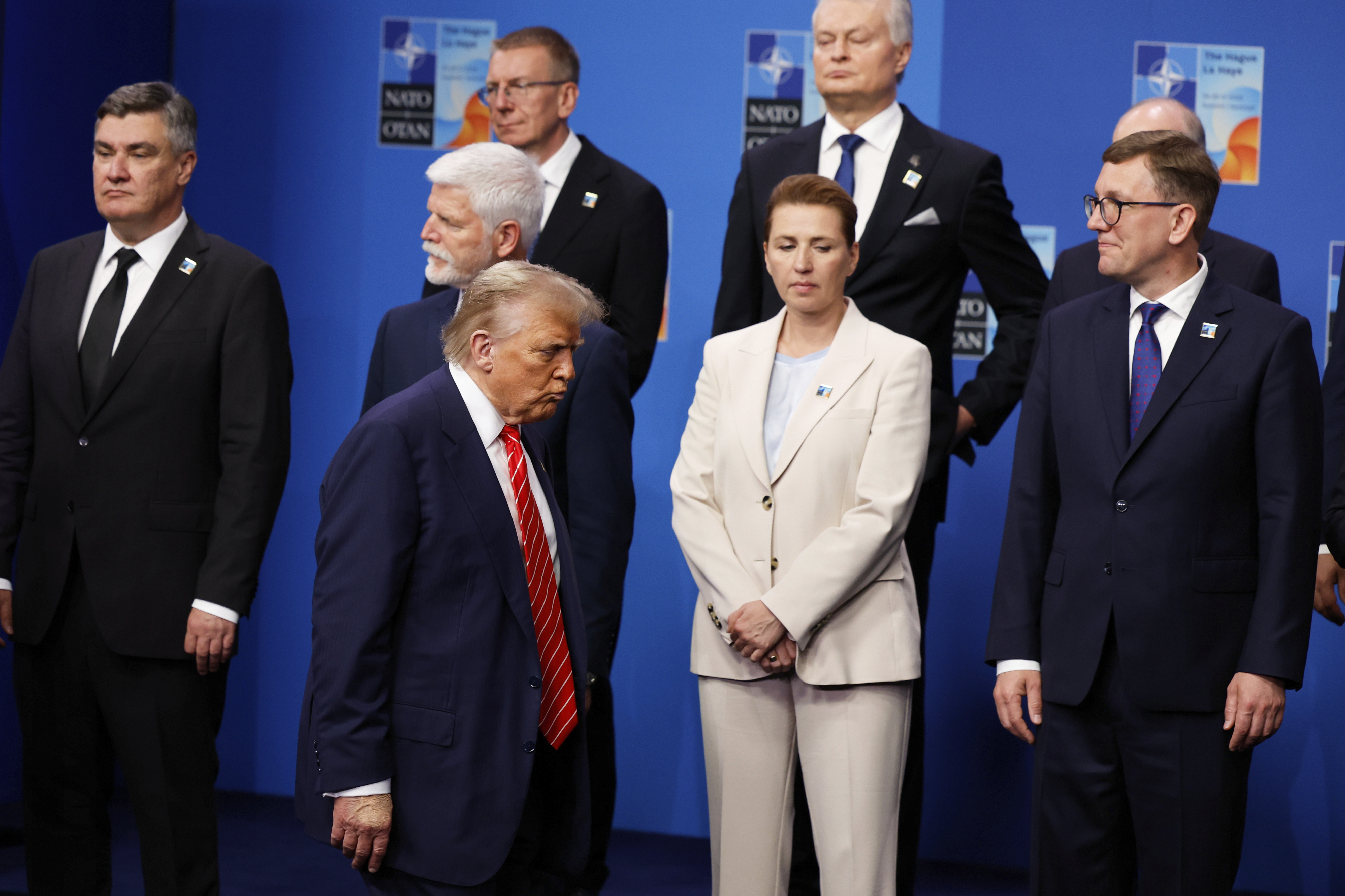 Trump walks past leaders including Denmark's Mette Frederiksen