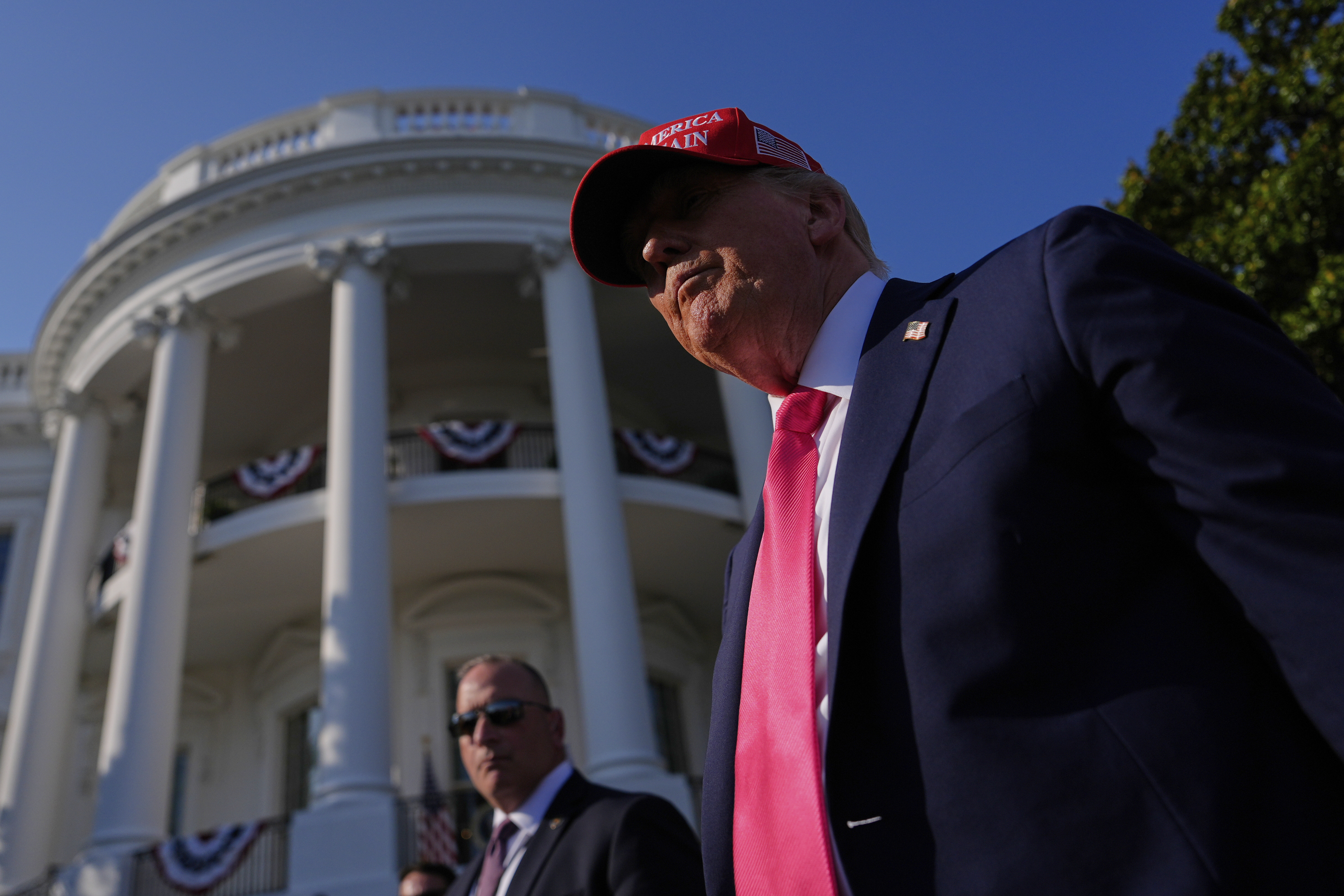 Trump greets guests outside the White House