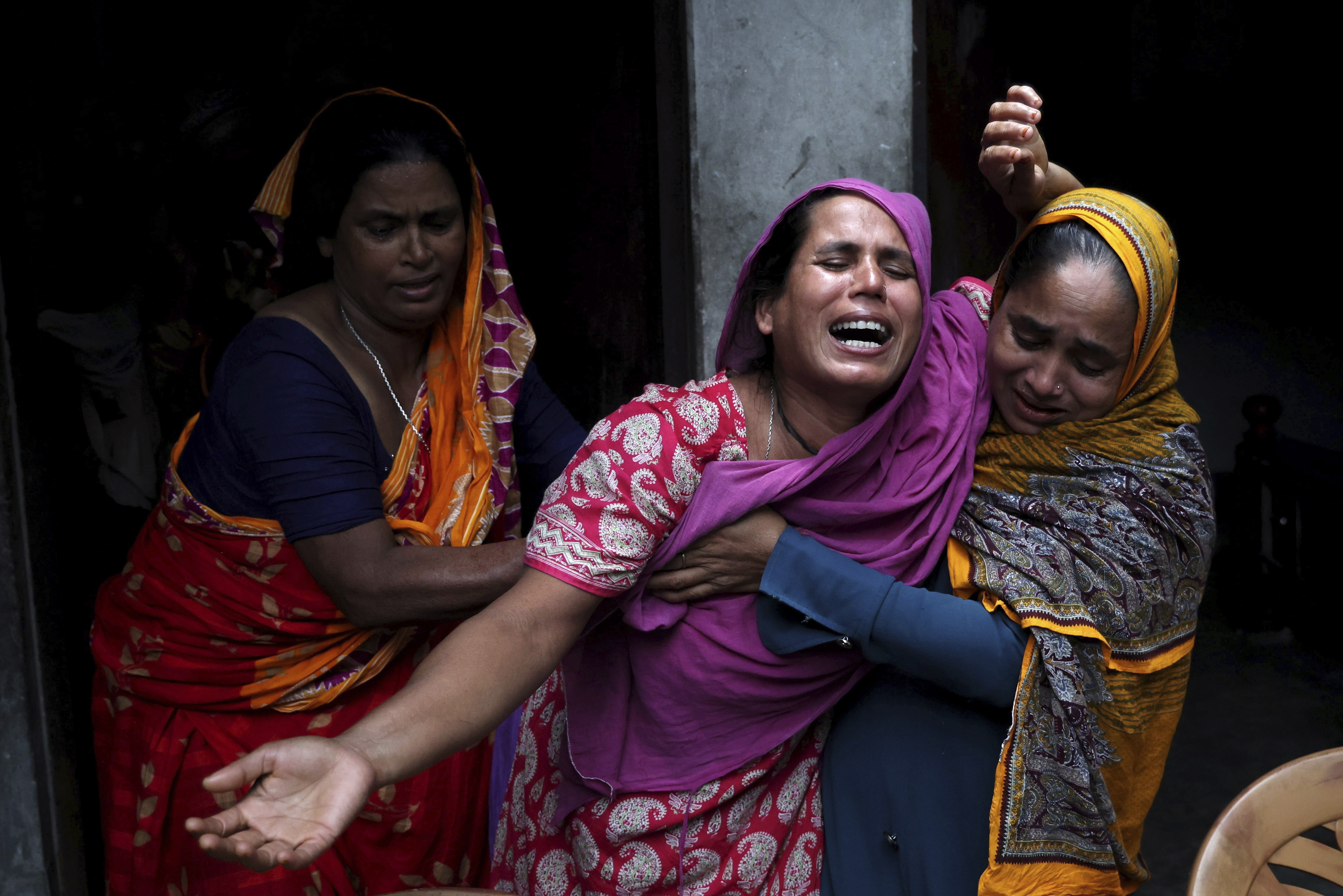 A woman mourns the death of her son who died during the previous day's violent clashes between supporters of ousted Prime Minister Sheikh Hasina and security forces in Gopalganj, Bangladesh, Thursday, July 17, 2025. (AP Photo/Abdul Goni)