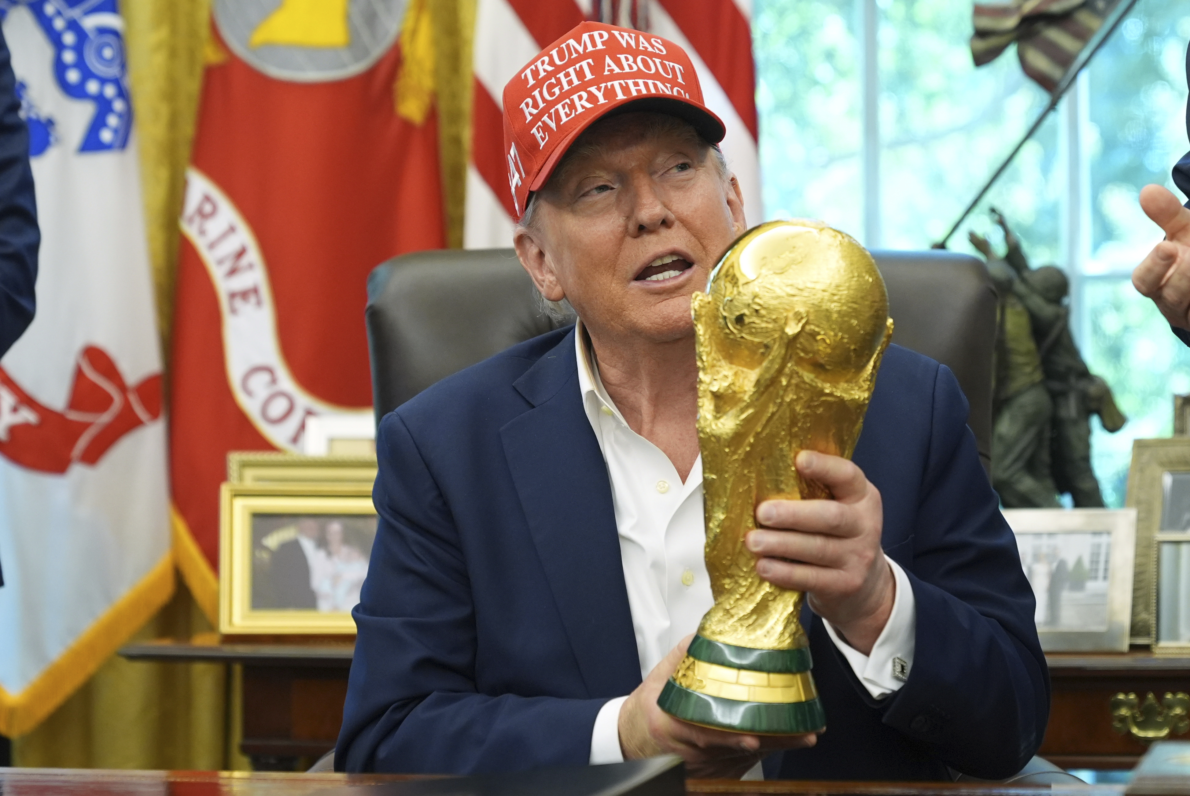 President Donald Trump holds the FIFA World Cup