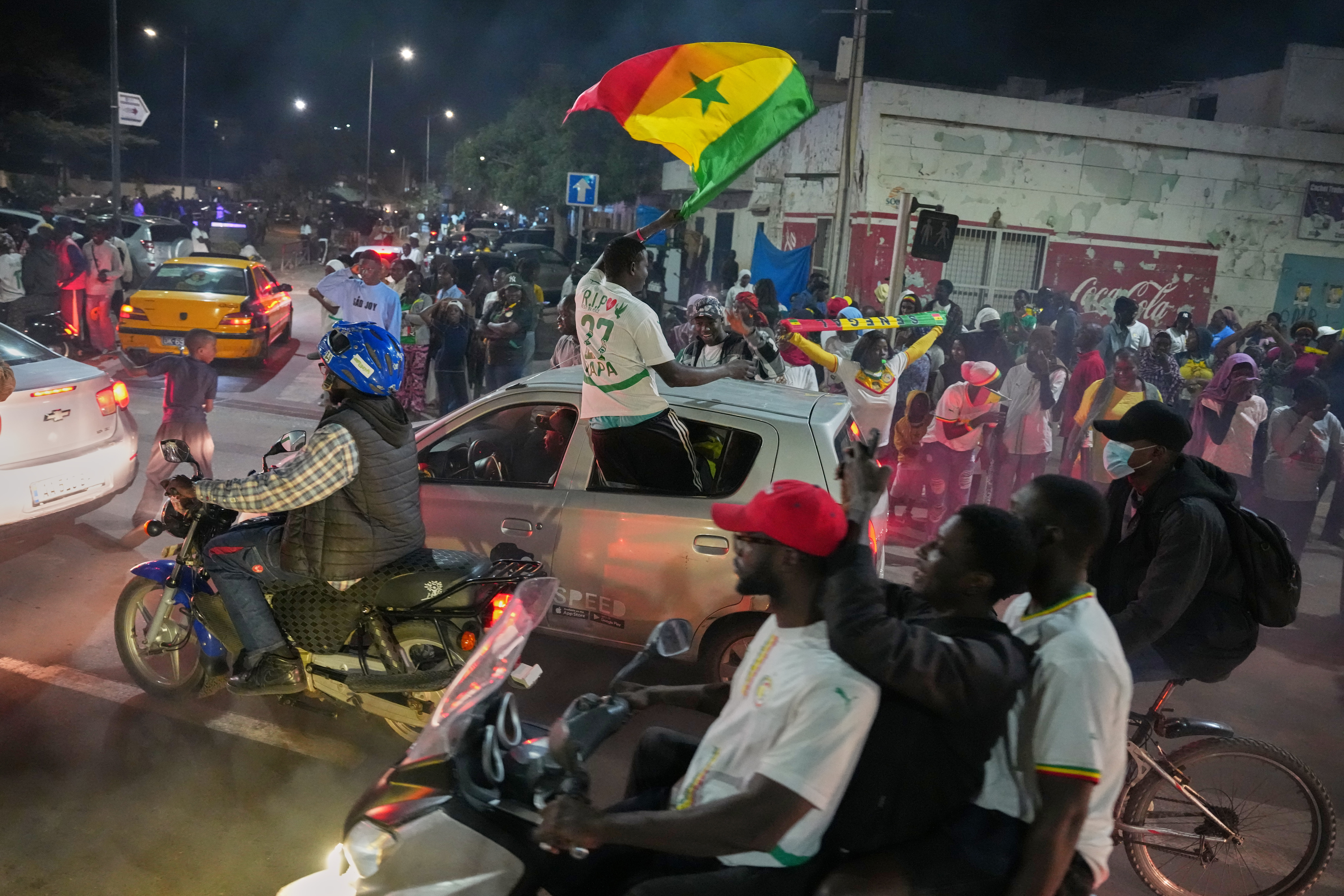 Morocco and Senegal celebrate advancing to the AFCON final showdown
