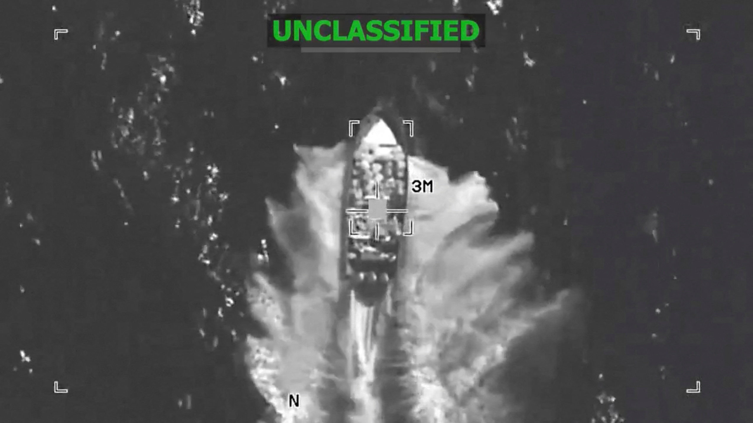 A U.S. military strike on what they said was a suspected drug vessel in international waters, at a location given as the Eastern Pacific in the screen grab from handout video released December 4, 2025. U.S. Southern Command/Handout via REUTERS THIS IMAGE HAS BEEN SUPPLIED BY A THIRD PARTY. OVERLAY AND WATERMARK FROM SOURCE. VERIFICATION LINES: - Reuters was not able to independently verify the location or the date when the video was filmed. - Upon checking this footage, no old results were found.