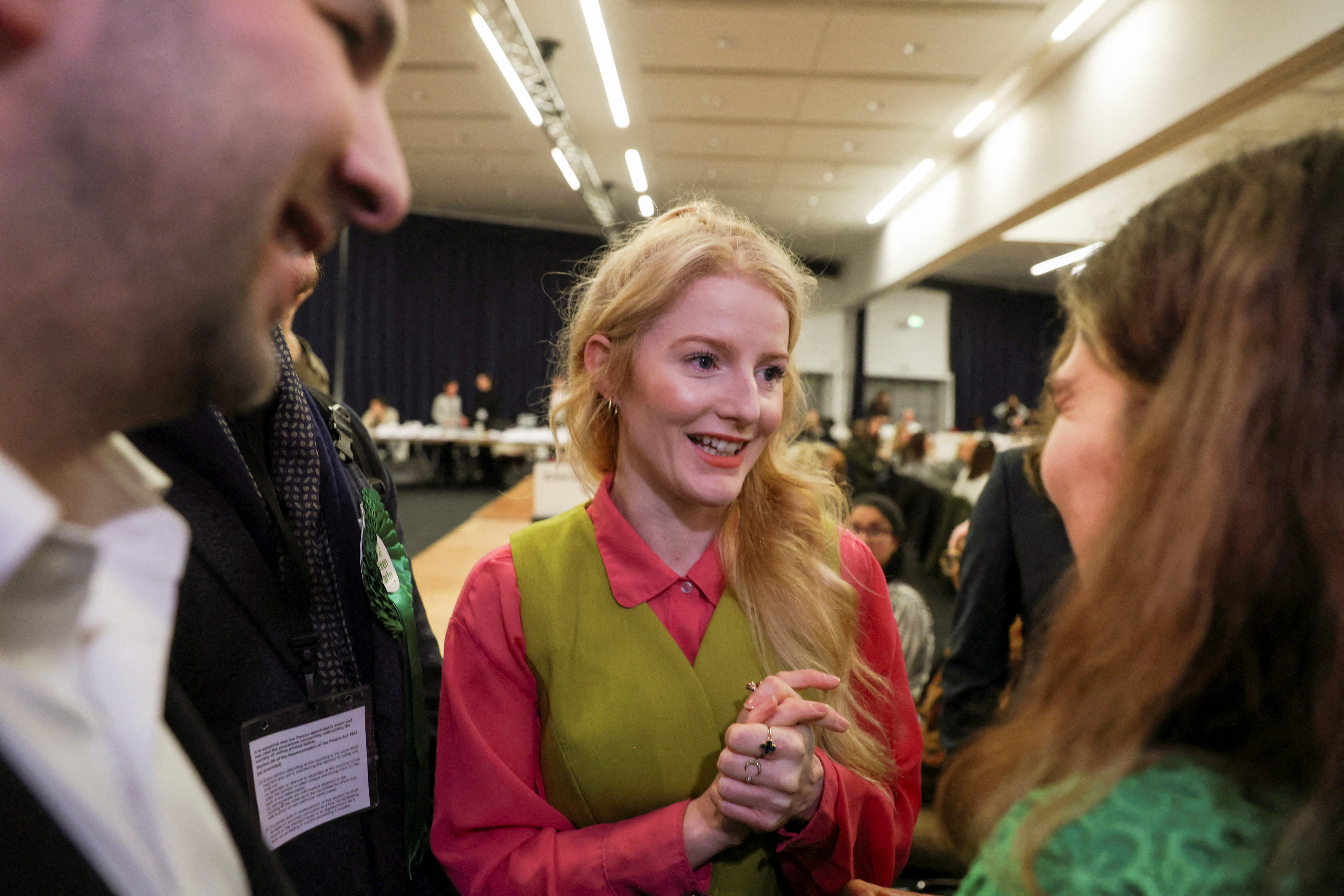 Green Party's candidate Hannah Spencer arrives during vote counting in the Gorton and Denton by-election.