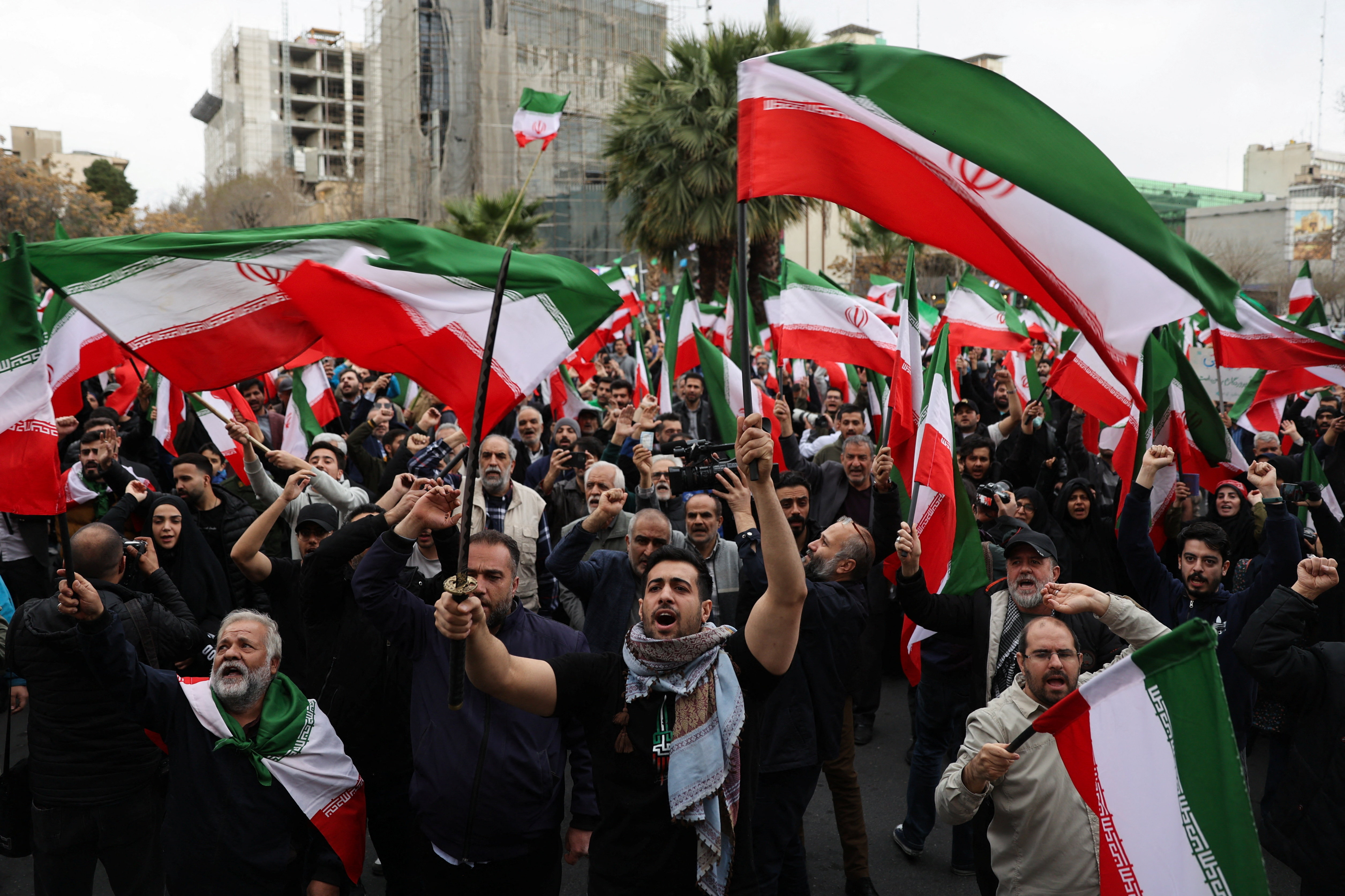 Iranian demonstrators protest against the US-Israeli strikes, in Tehran, Iran