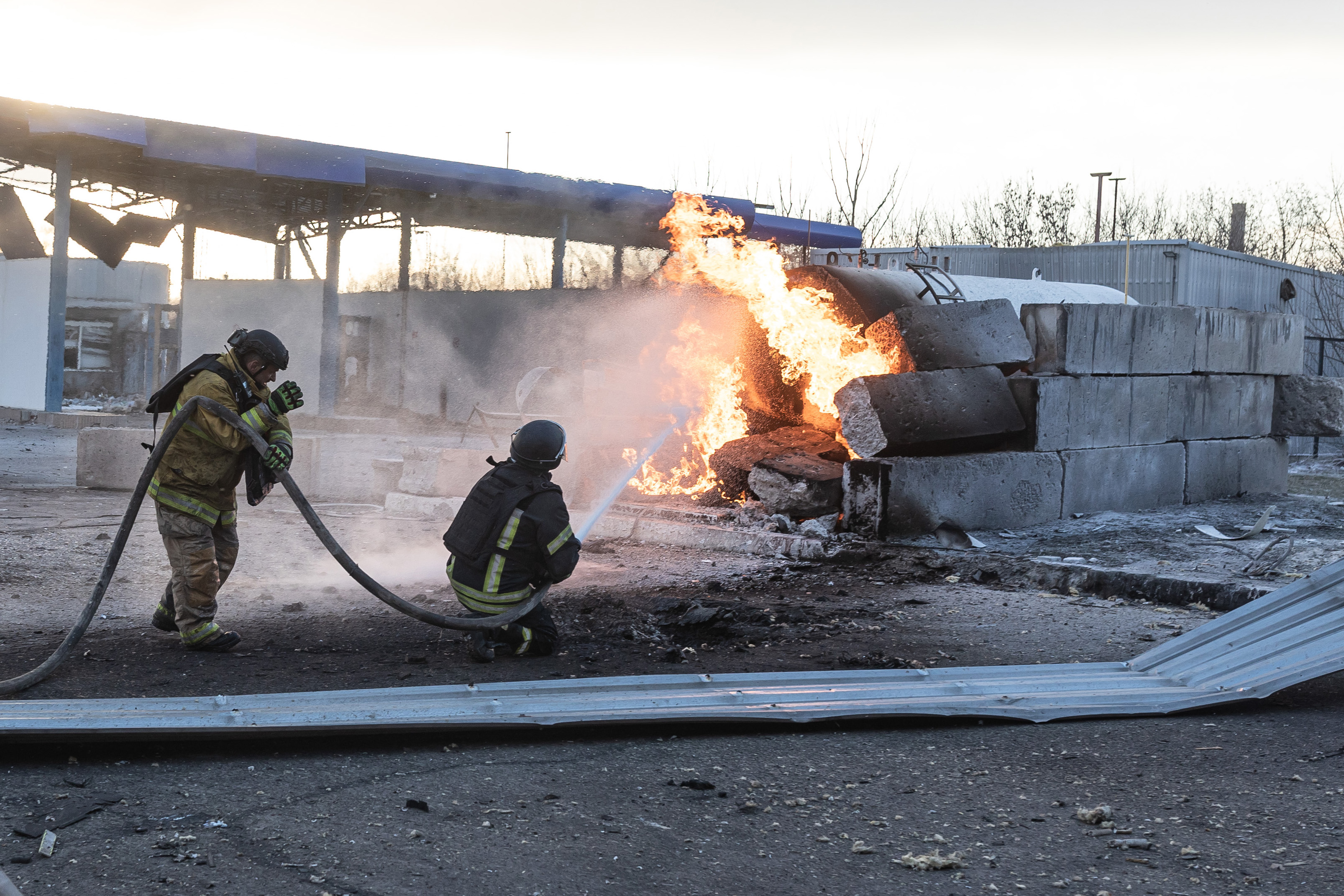 Ukrainian firefighters extinguish a fire at a petrol station, started after two Russian ‘Sahed’ drones hit it, in the city of Kramatorsk, Ukraine, 9 February 2026. [Diego Herrera Carcedo/Anadolu Agency]