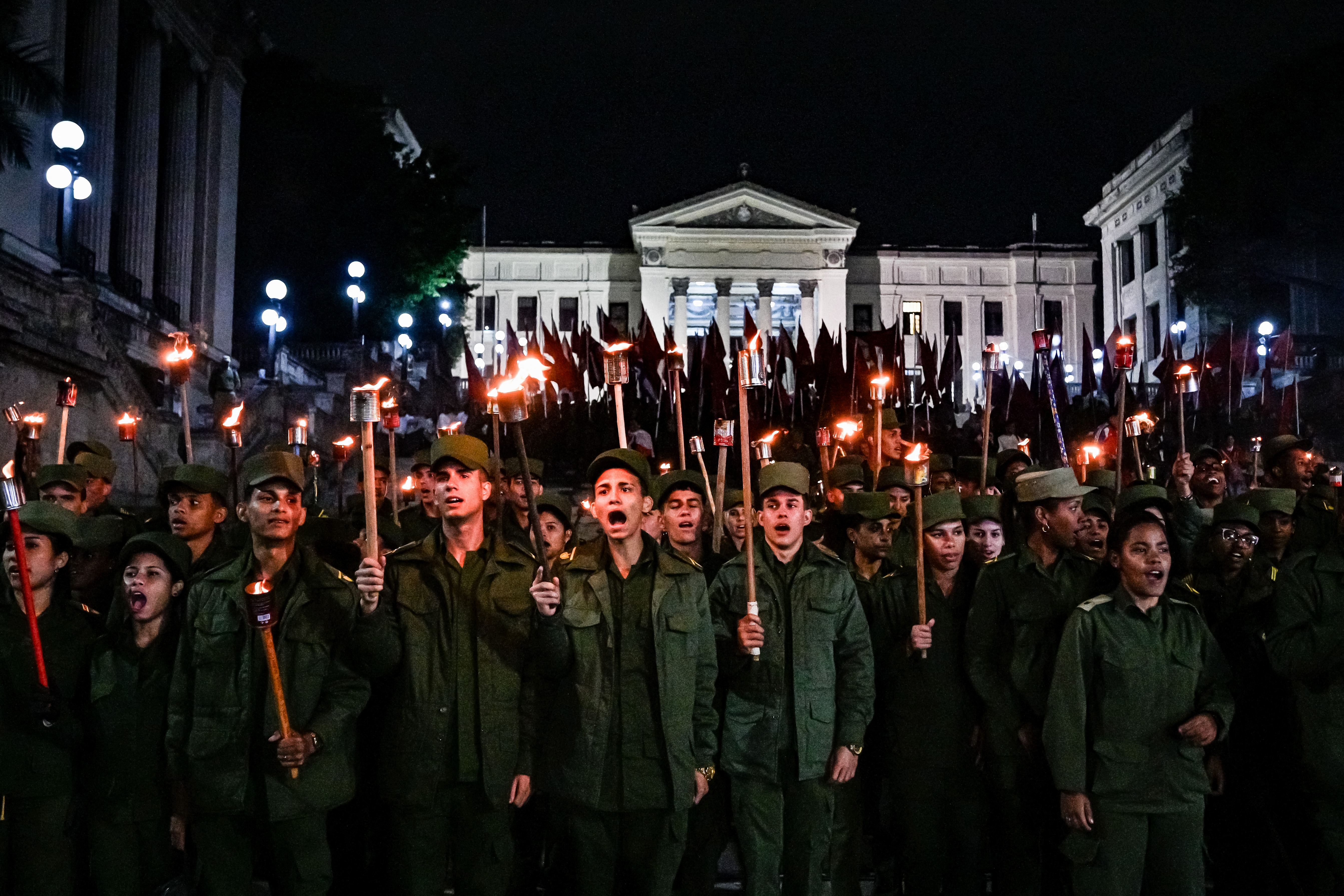 Cuban soldiers take part in the Torchlight March on the 173rd anniversary of National Hero Jose Marti (a leader of Cubas independence from Spain and founder of the Cuban Revolutionary Party) in Havana