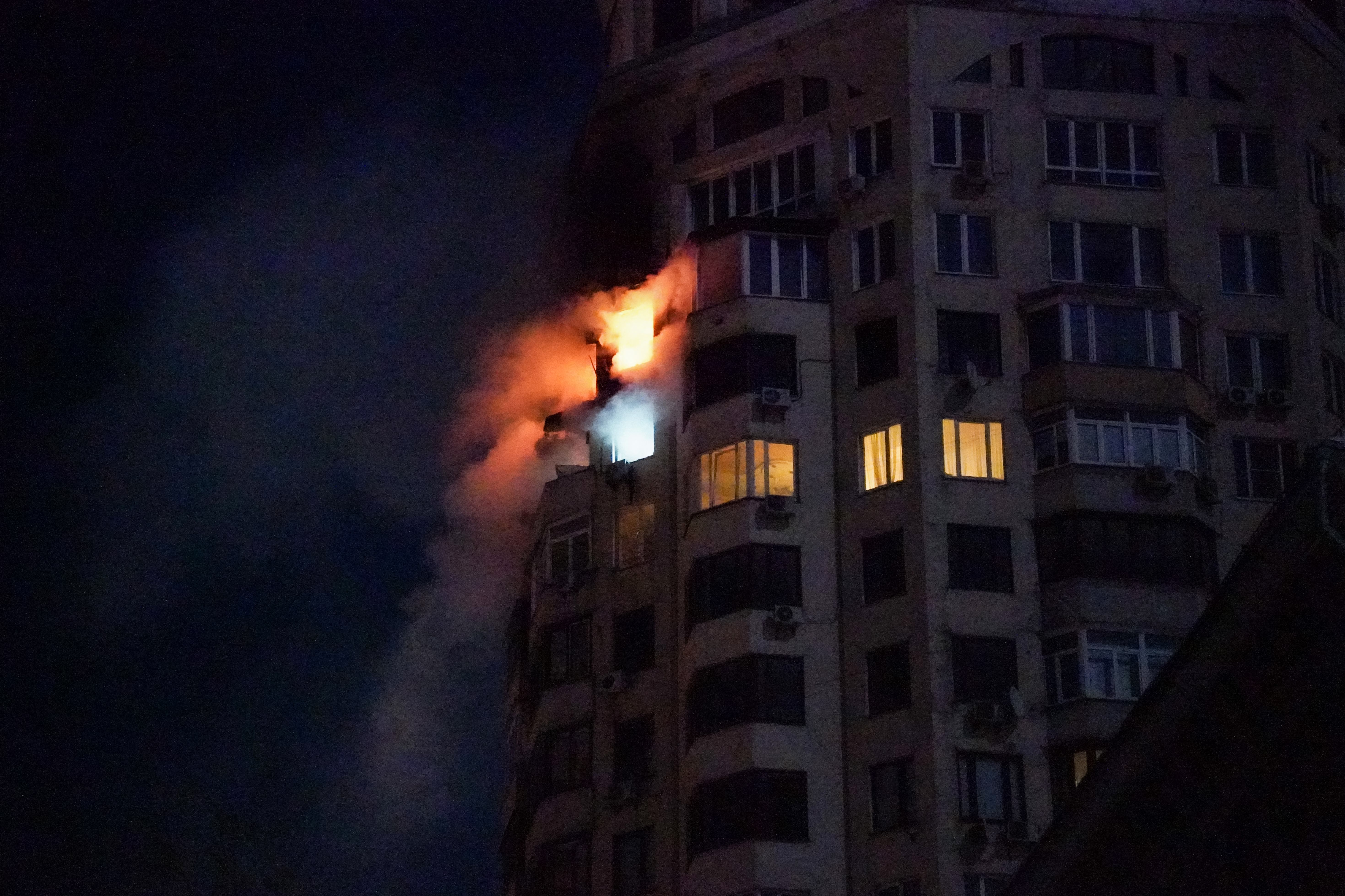 Fire is visible in a Kyiv apartment building.