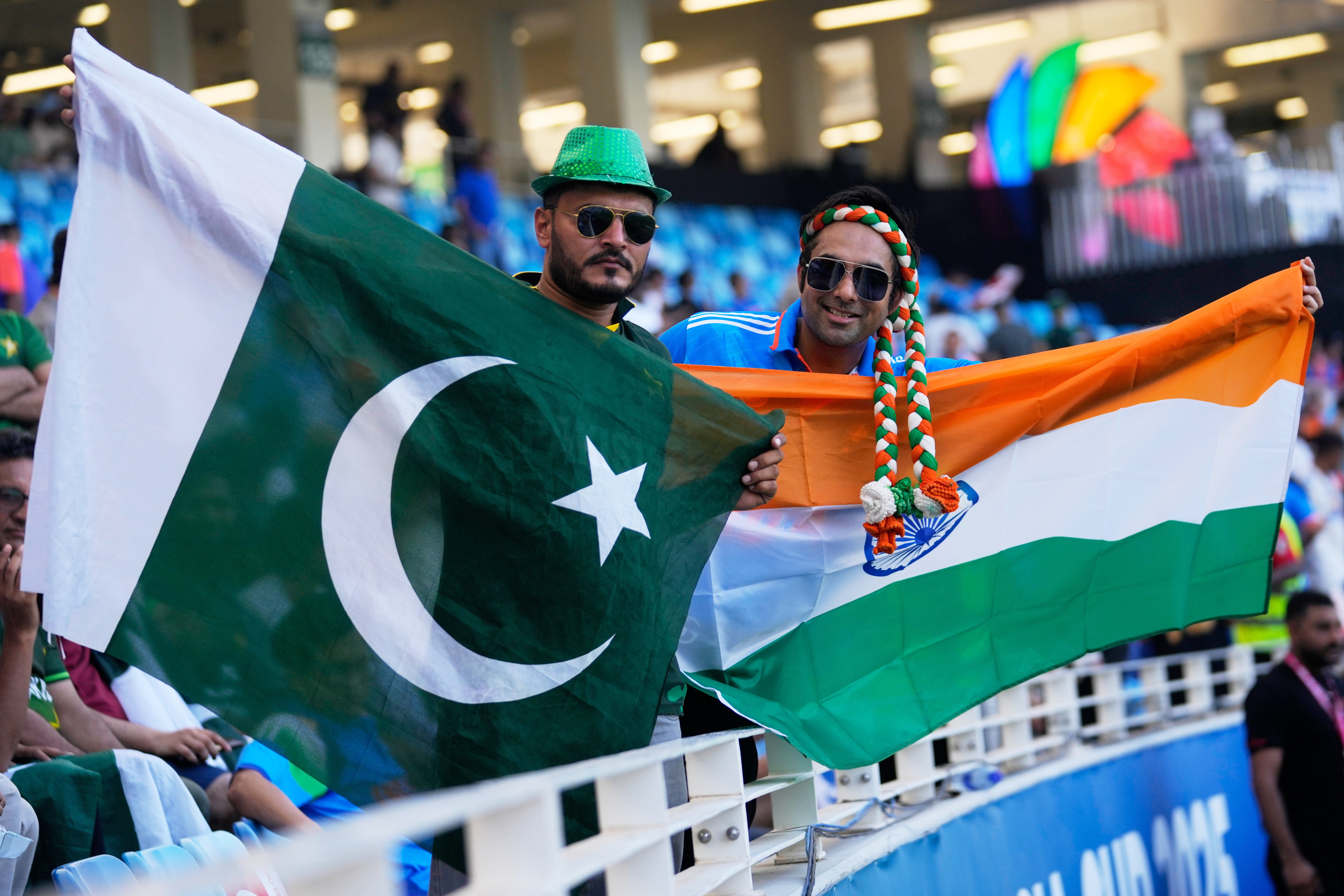 India's and Pakistan's fans carry their national flags