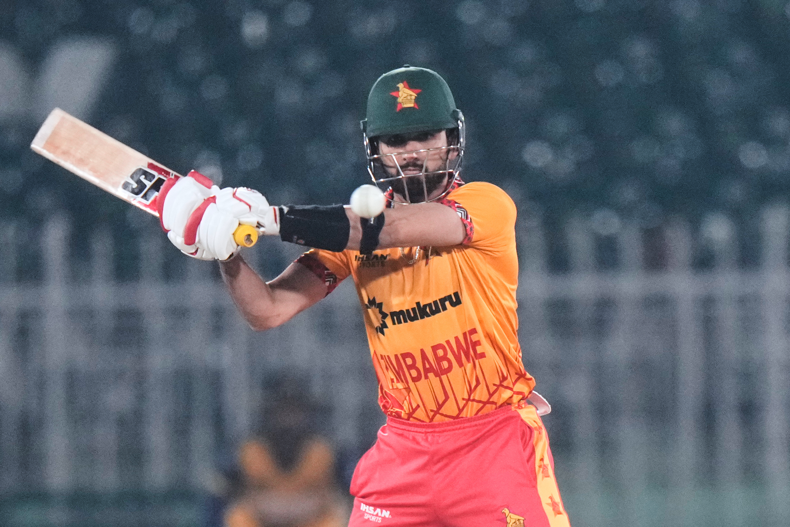 Zimbabwe's Sikandar Raza plays a shot during the tri-series T20 cricket match between Sri Lanka and Zimbabwe, in Rawalpindi, Pakistan, Thursday, Nov. 20, 2025