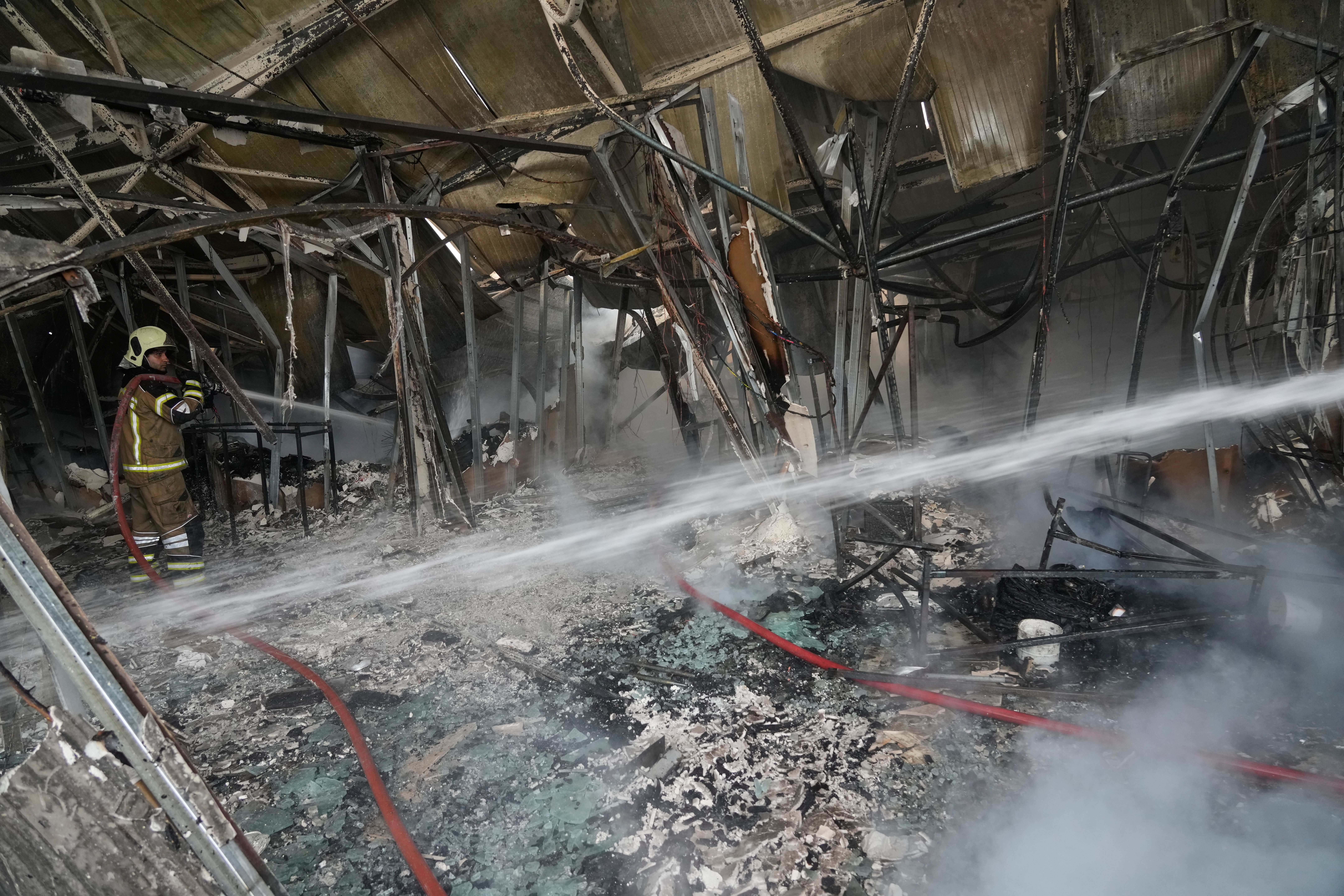 Major Tehran bazaar fire that sent thick smoke over city is under control, with no injuries reported.