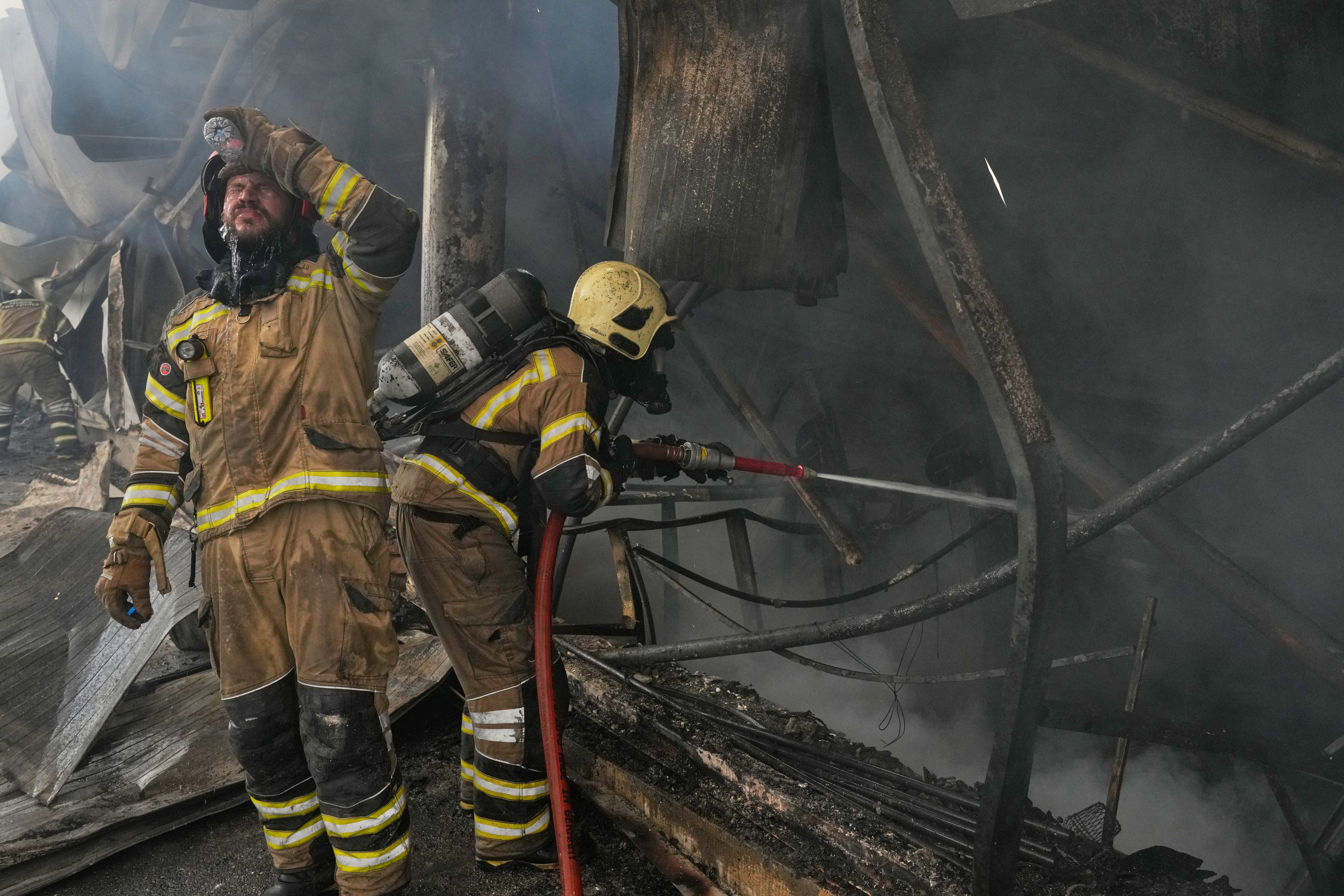 Major Tehran bazaar fire that sent thick smoke over city is under control, with no injuries reported.