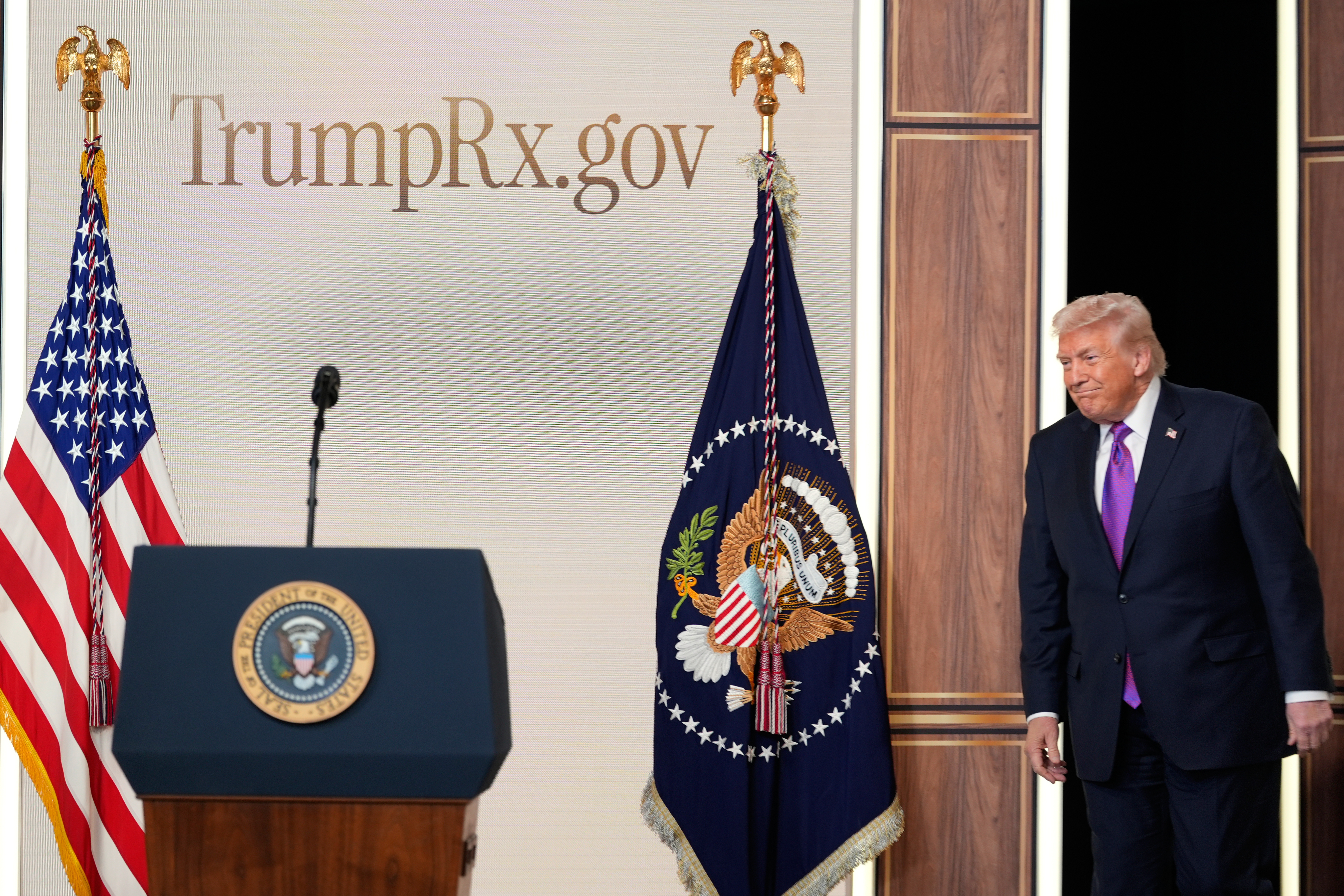 President Donald Trump arrives to speak about TrumpRx in the South Court Auditorium in the Old Eisenhower Executive Office Building on the White House campus, Thursday, Feb. 5, 2026, in Washington. (AP Photo/Alex Brandon)