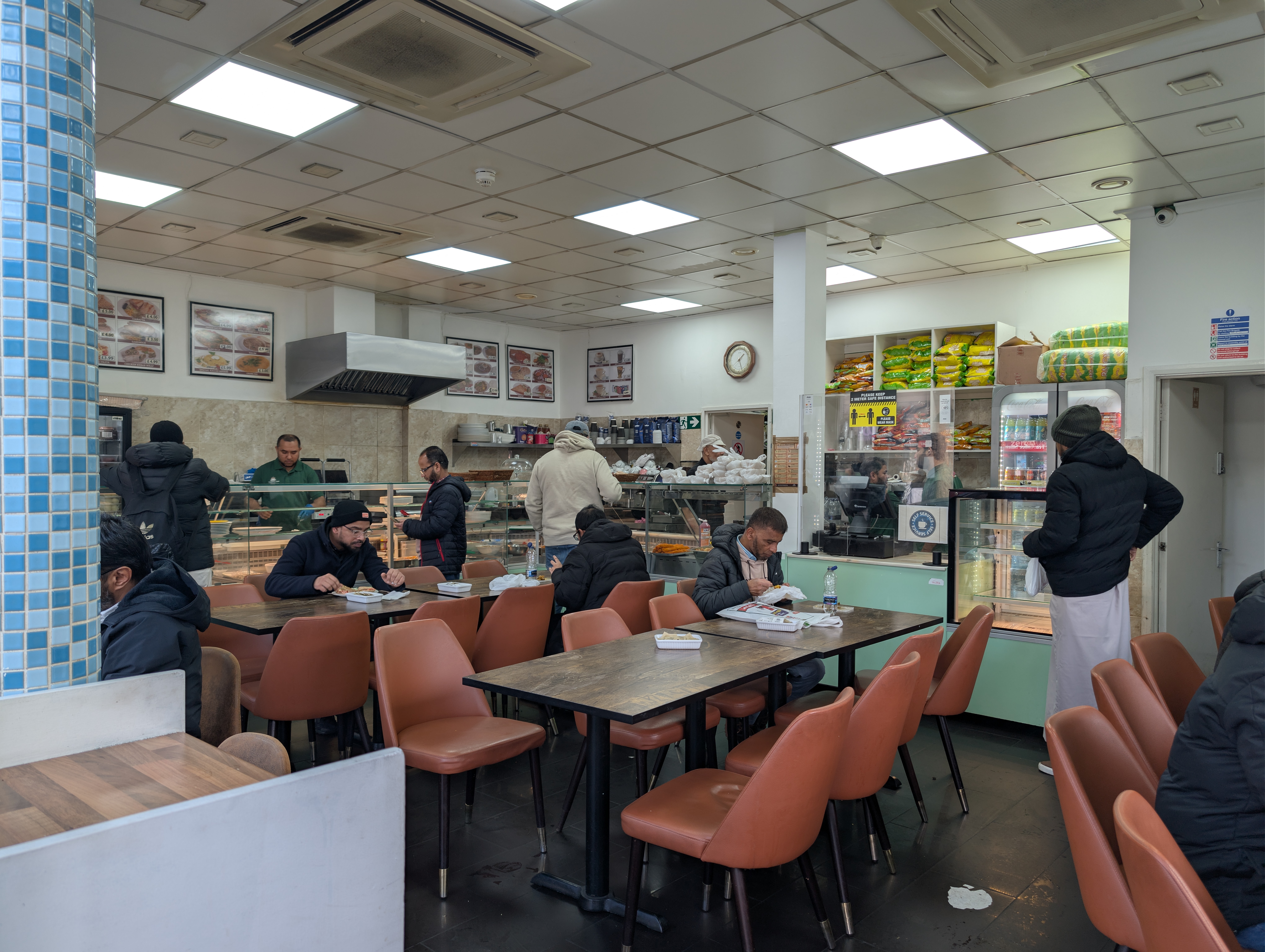 Casablanca Cafe in East London, a popular haunt among the Bangladeshi diaspora, where chatter about the upcoming election is hard to miss [Indlieb Farazi Saber/ Al Jazeera]