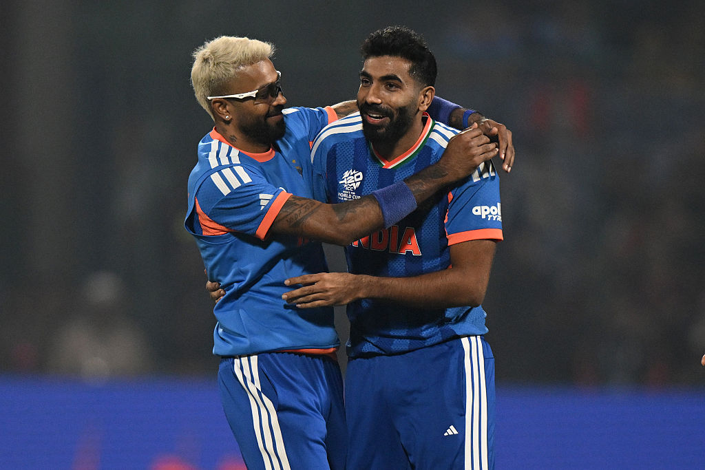 Jasprit Bumrah of India celebrates with Hardik Pandya after dismissing Ruben Trumpelmann of Namibia during the ICC Men's T20 World Cup