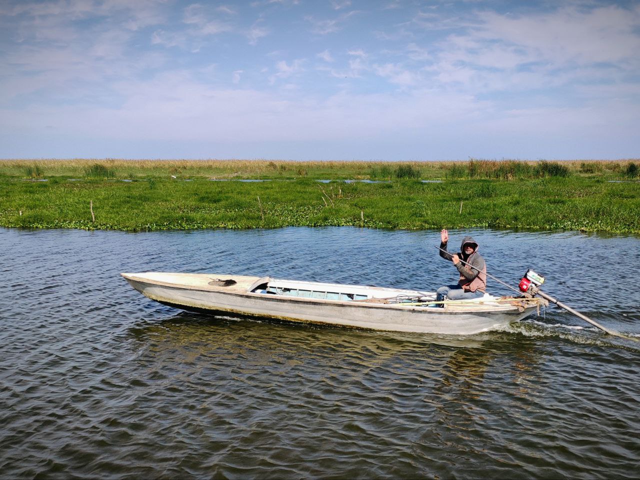 Man on boat in Lake Manzala