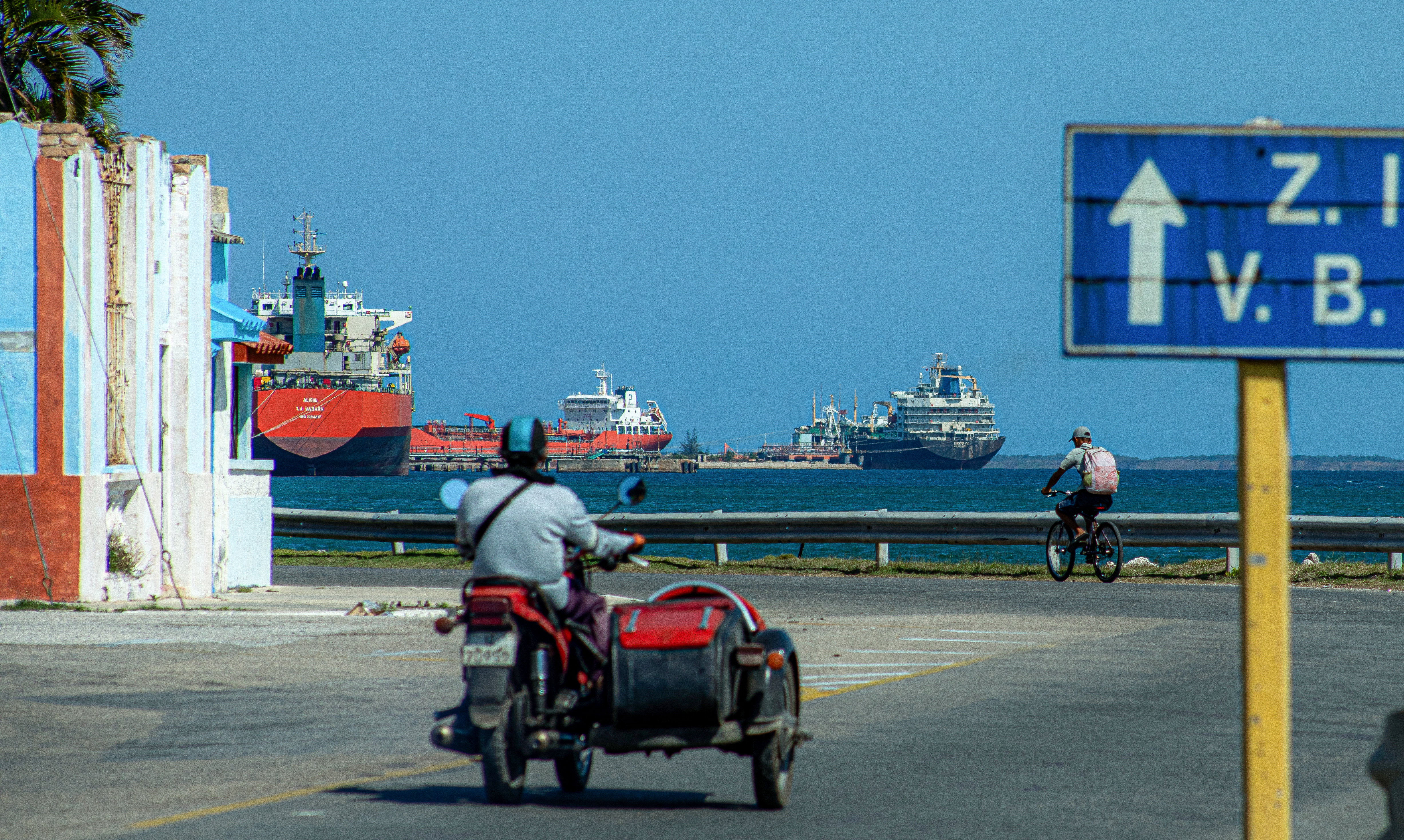 The Nicos I.V. oil tanker (R), sailing under the flag of Saint Vincent and the Grenadines, is seen alongside other tanker vessels in the port of Matanzas, Cuba, on February 17, 2026. (Photo by STRINGER / AFP)